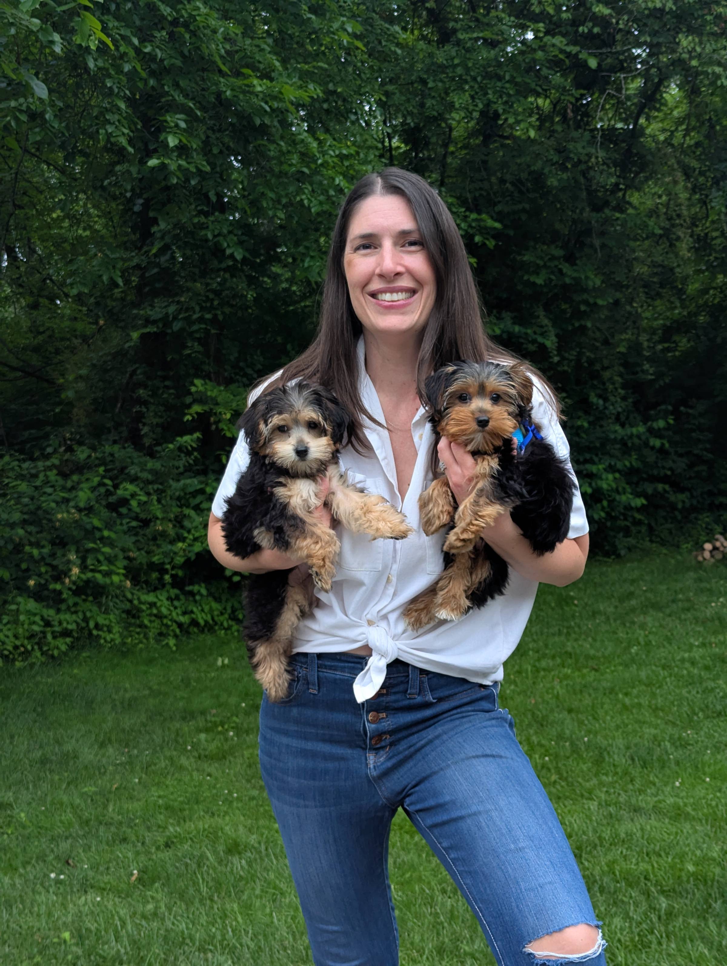 Allison and her two Yorkie puppies.