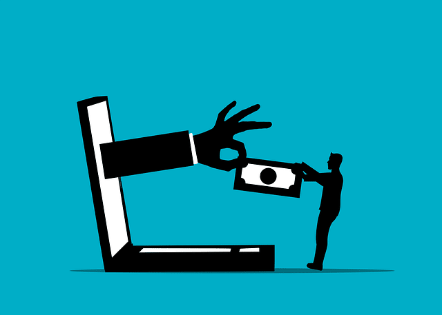 A hand reaches out of a computer to steal money from a person