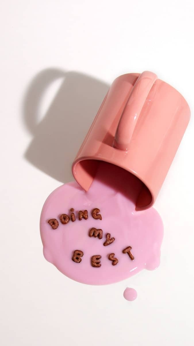 pink ceramic mug with love print