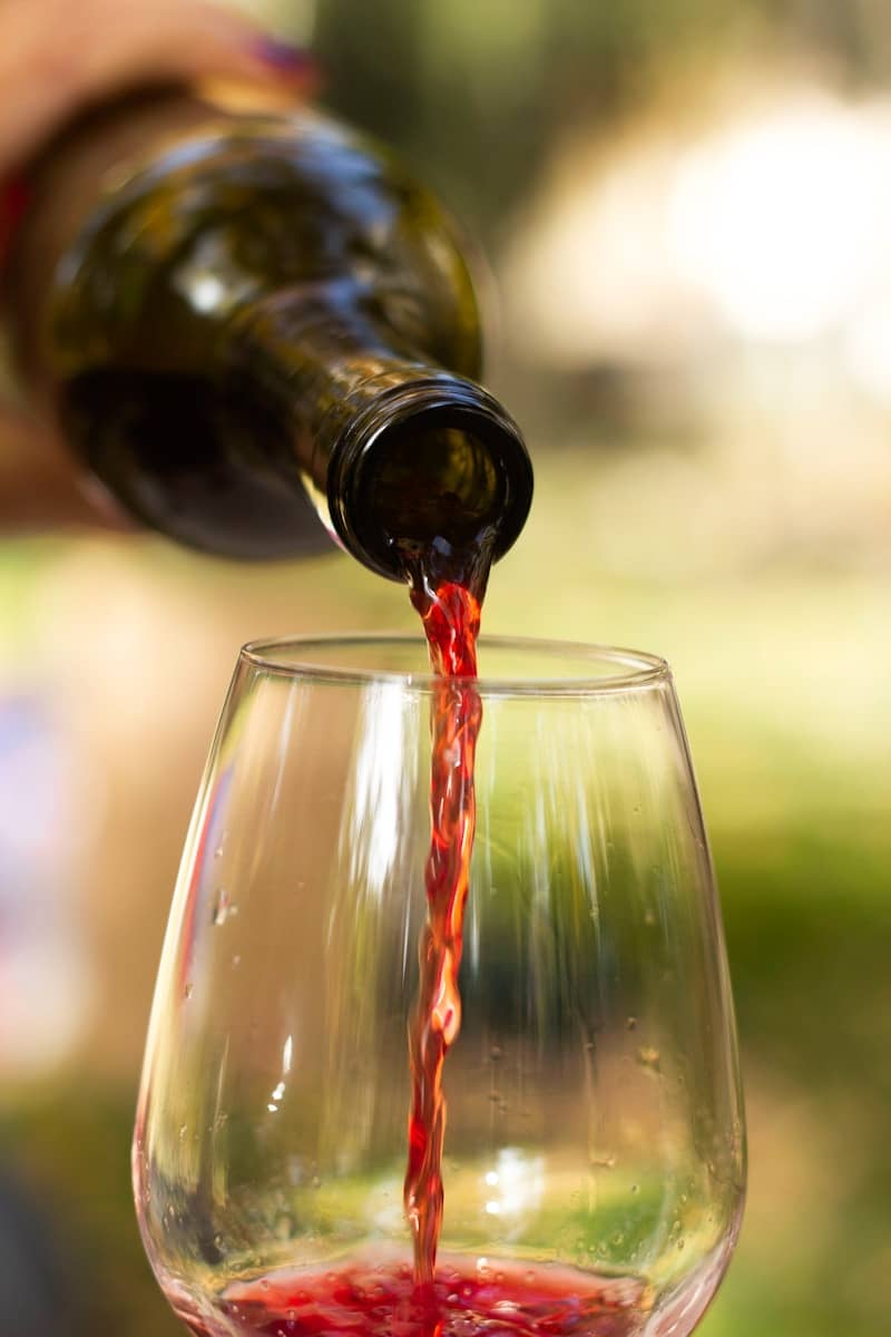 clear wine glass with red wine