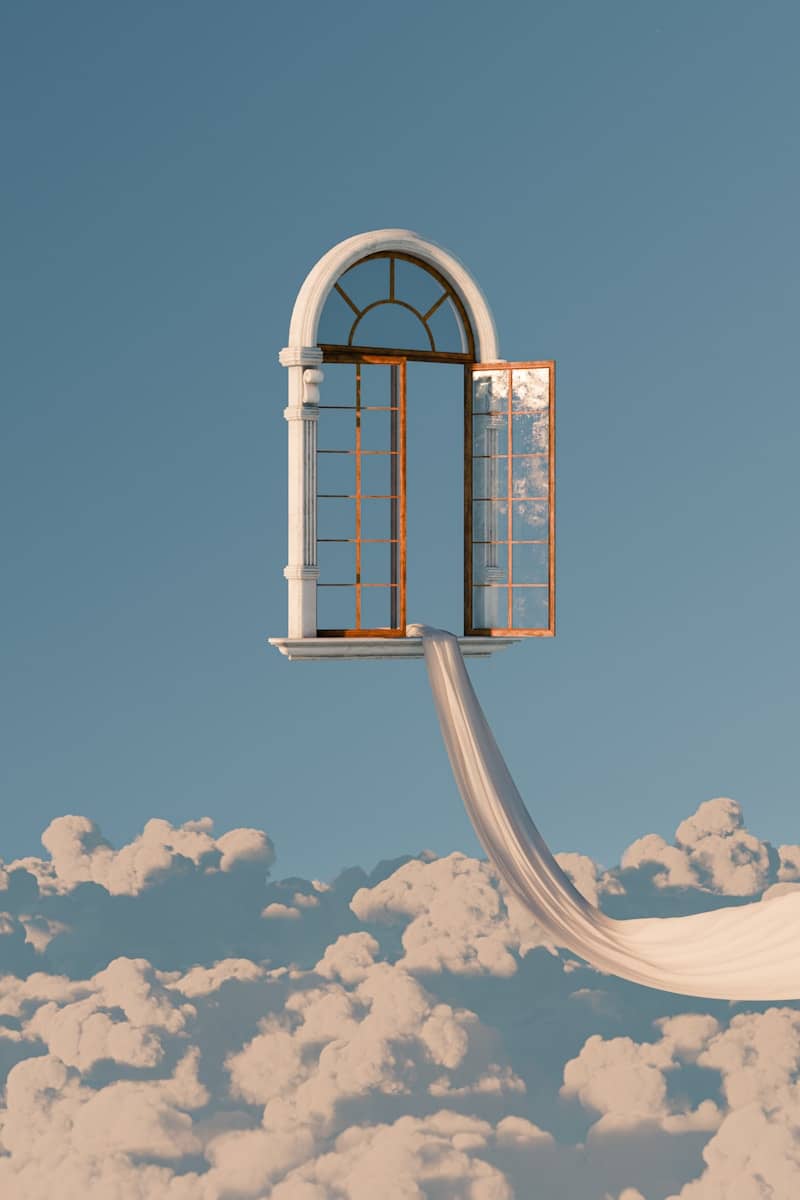 An open window floats above clouds with a flowing path.