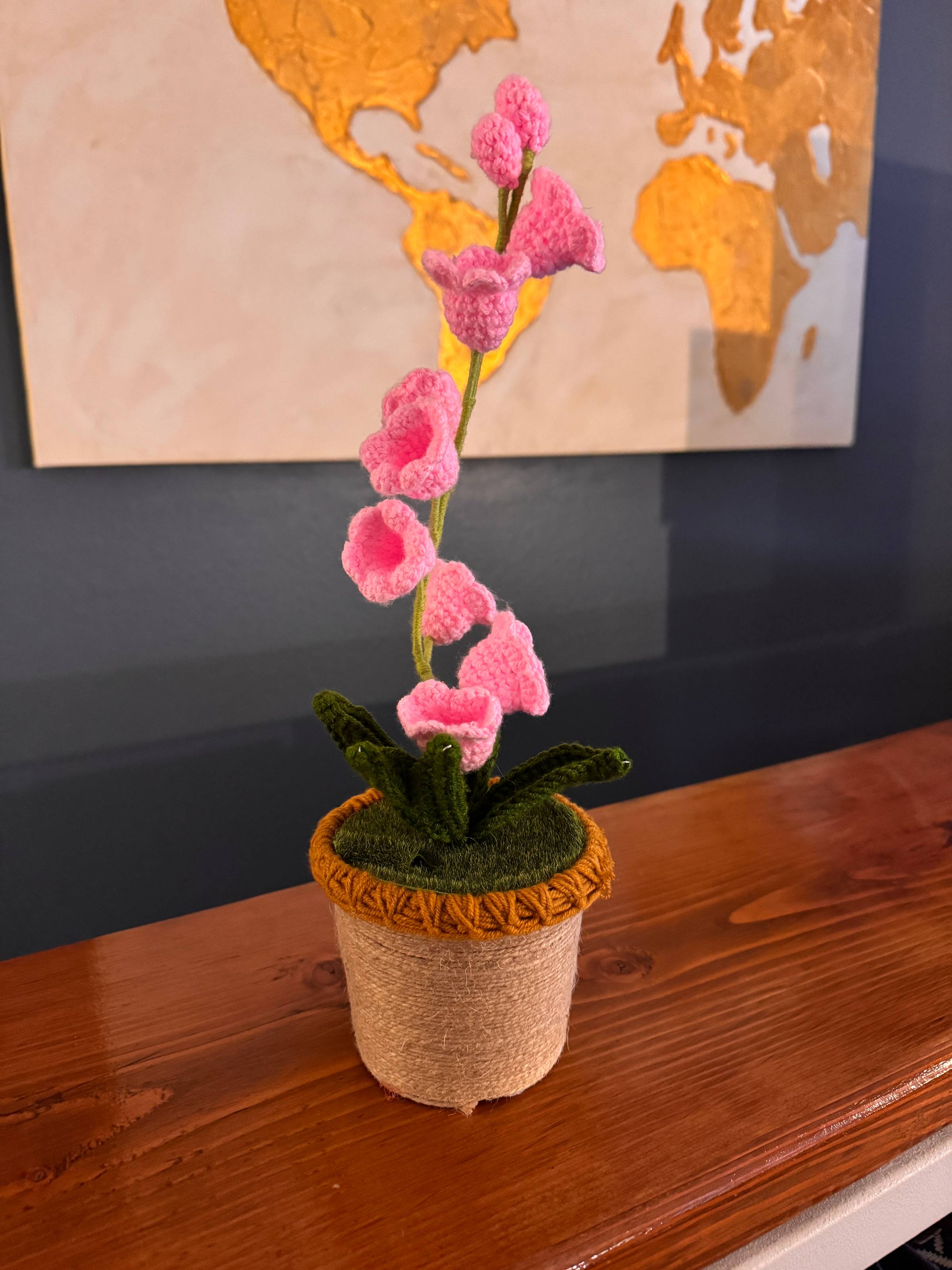A crocheted flower lamp