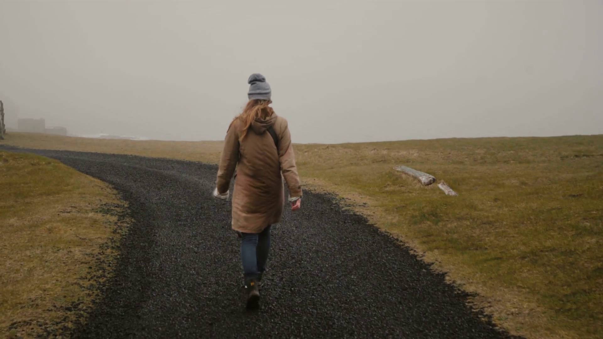 Sad woman walking alone