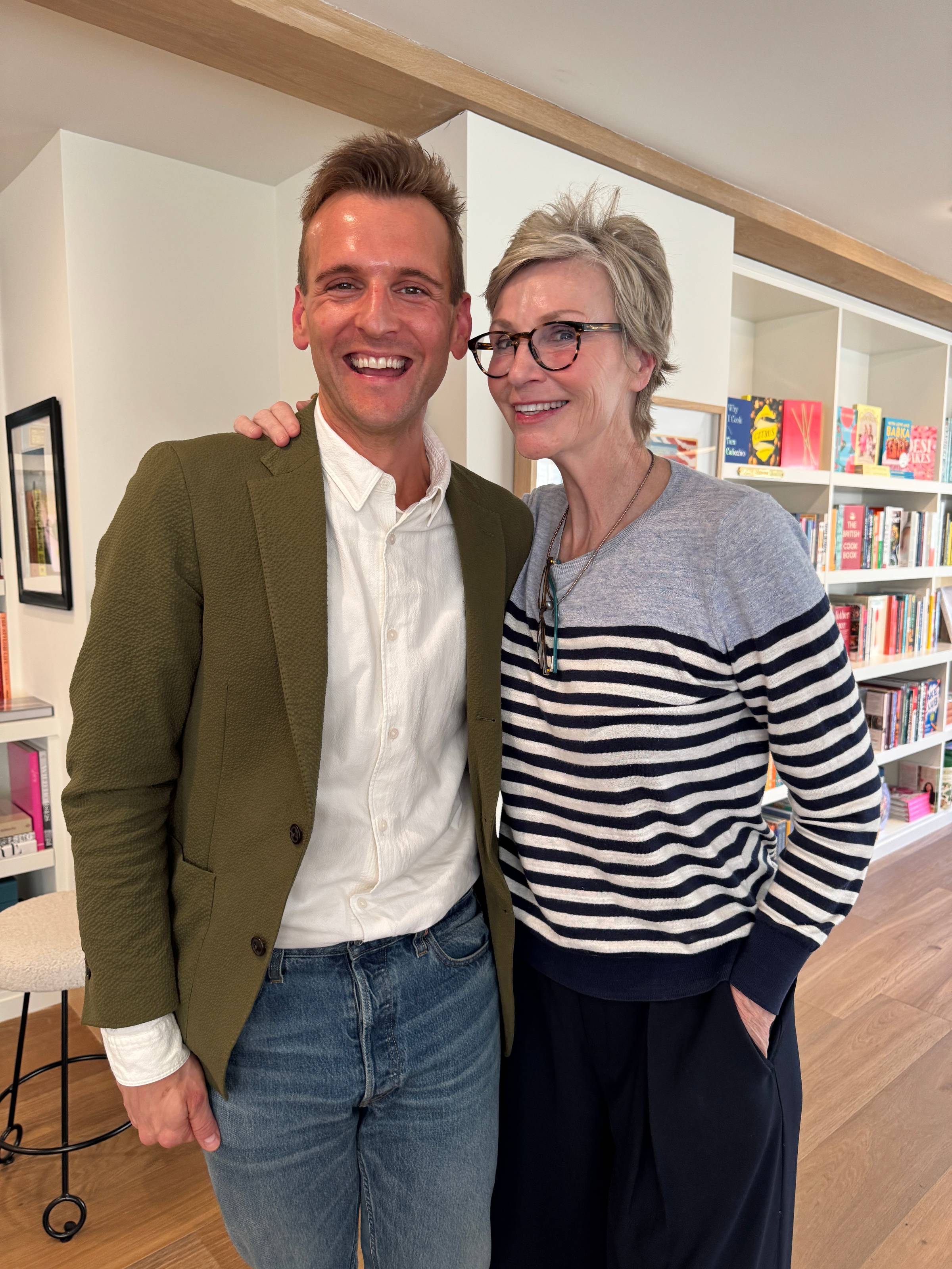 Kaleb Wyse standing with Jane Lynch.
