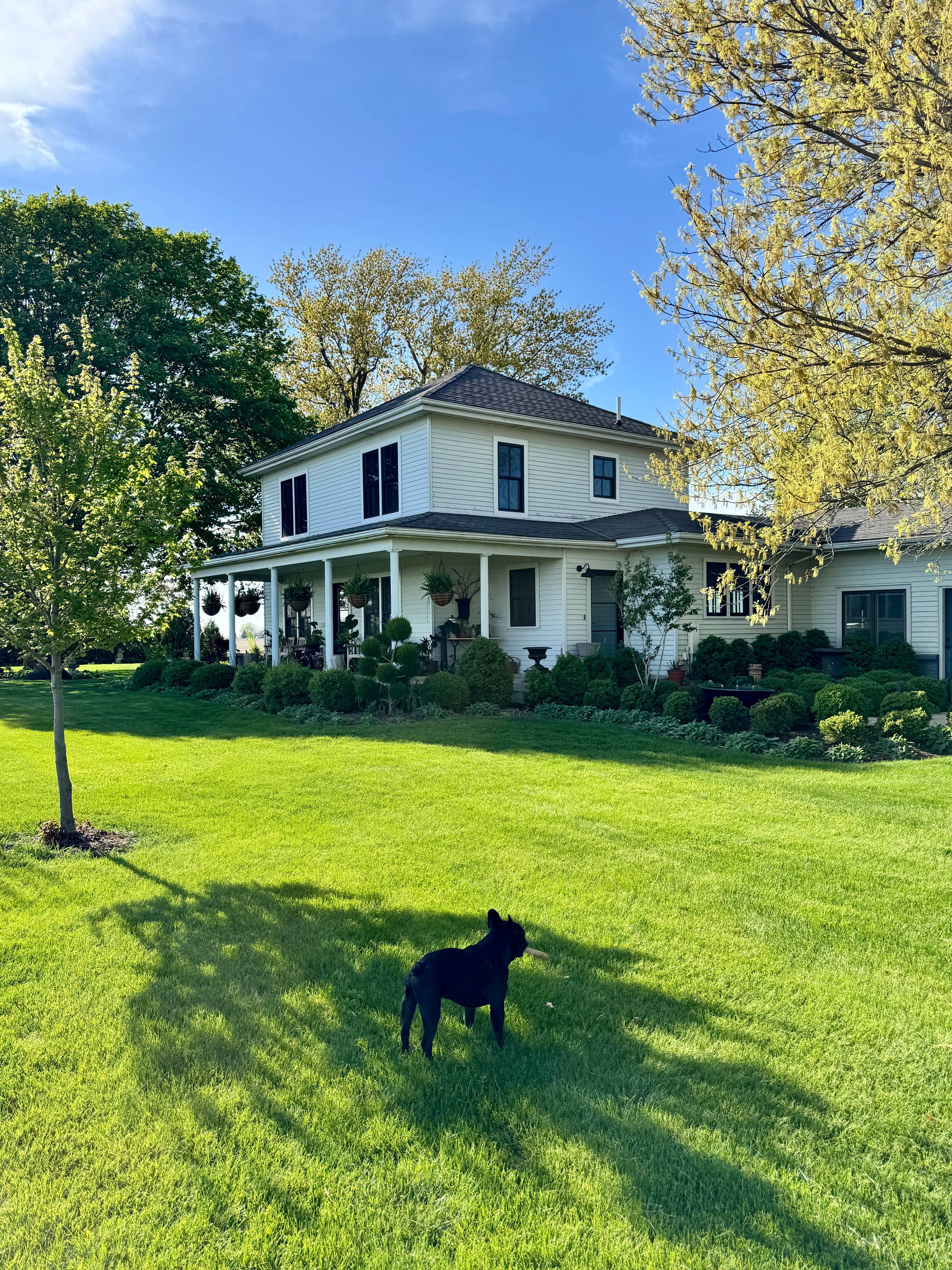 Front of white farmhouse.