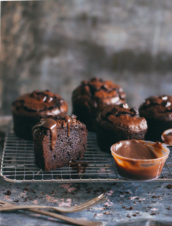 Fudgy chocolate brownie muffins with a drizzle of chocolate ganache