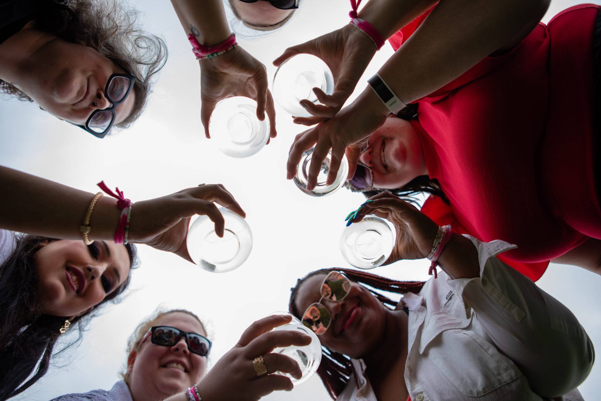 women holding wine glasses