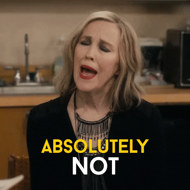 Catherine O'Hara as Moira Rose in Schitt's Creek saying "Absolutely not." She has blonde hair in a bob and red lipstick on.