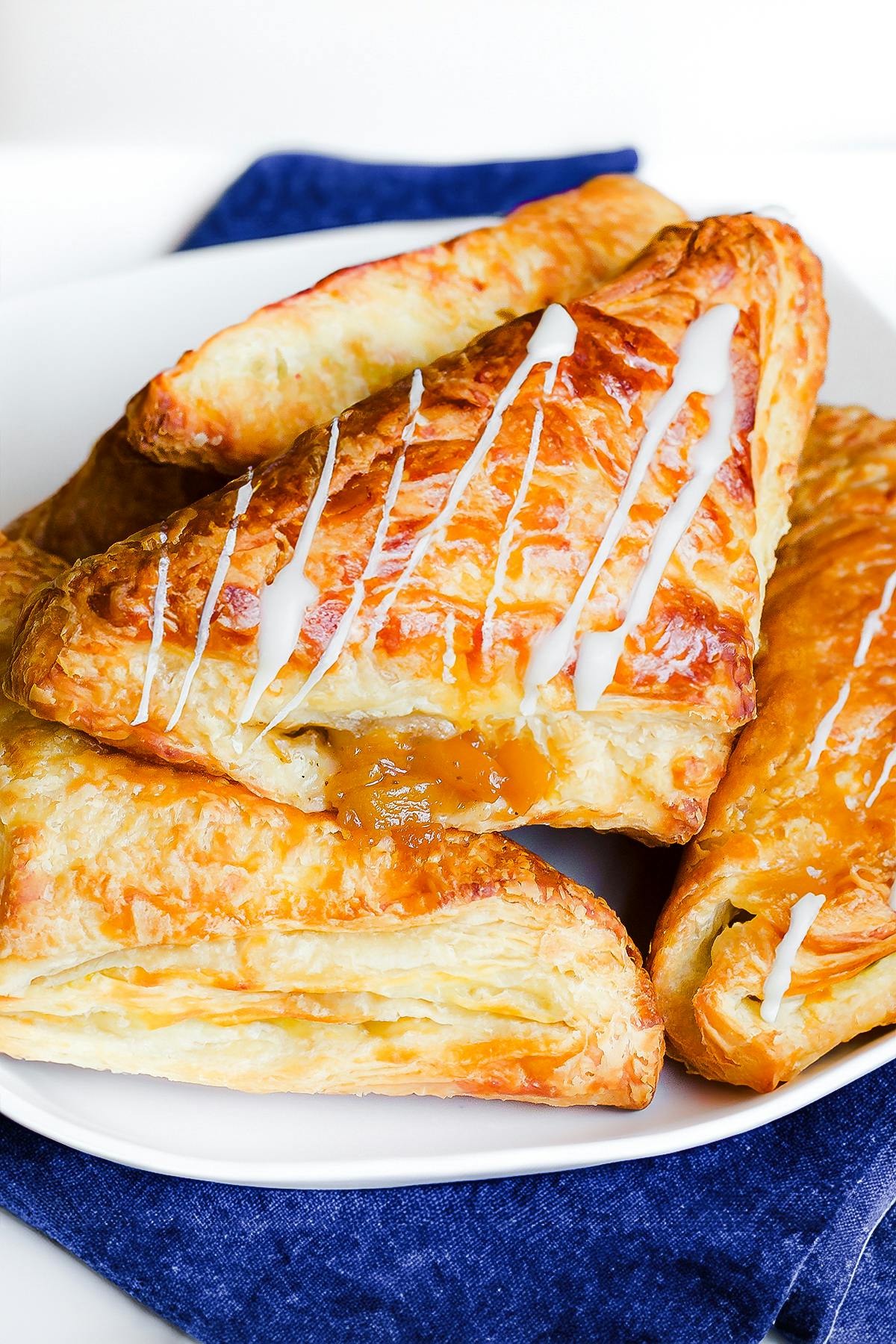 apple turnovers with a sprinkle of white icing glaze 