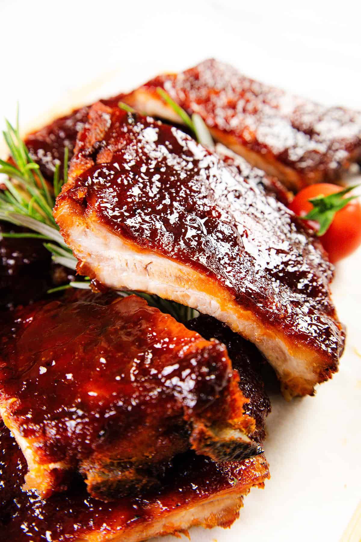 delicious barbecued ribs with homemade bbq sauce