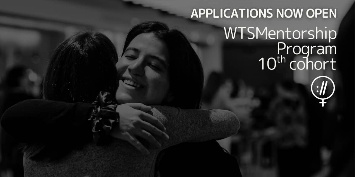 Two people hug warmly in a black-and-white image. Text reads "Applications Now Open: WTSMentorship Program 10th Cohort," conveying a sense of opportunity and connection.