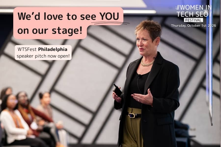 Woman speaking on stage at a tech event. Audience in background. Text: "We’d love to see YOU on our stage! WTSFest Philadelphia speaker pitch now open!" "Women in Tech SEO Festival, Thursday, October 1st 2026." The setting is professional and inviting.
