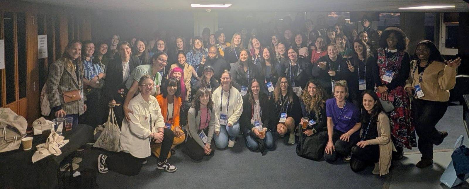 WTSers at the brightonSEO WTS meetup last October. The room is filled with wonderful people and they're all smiling for the camera.