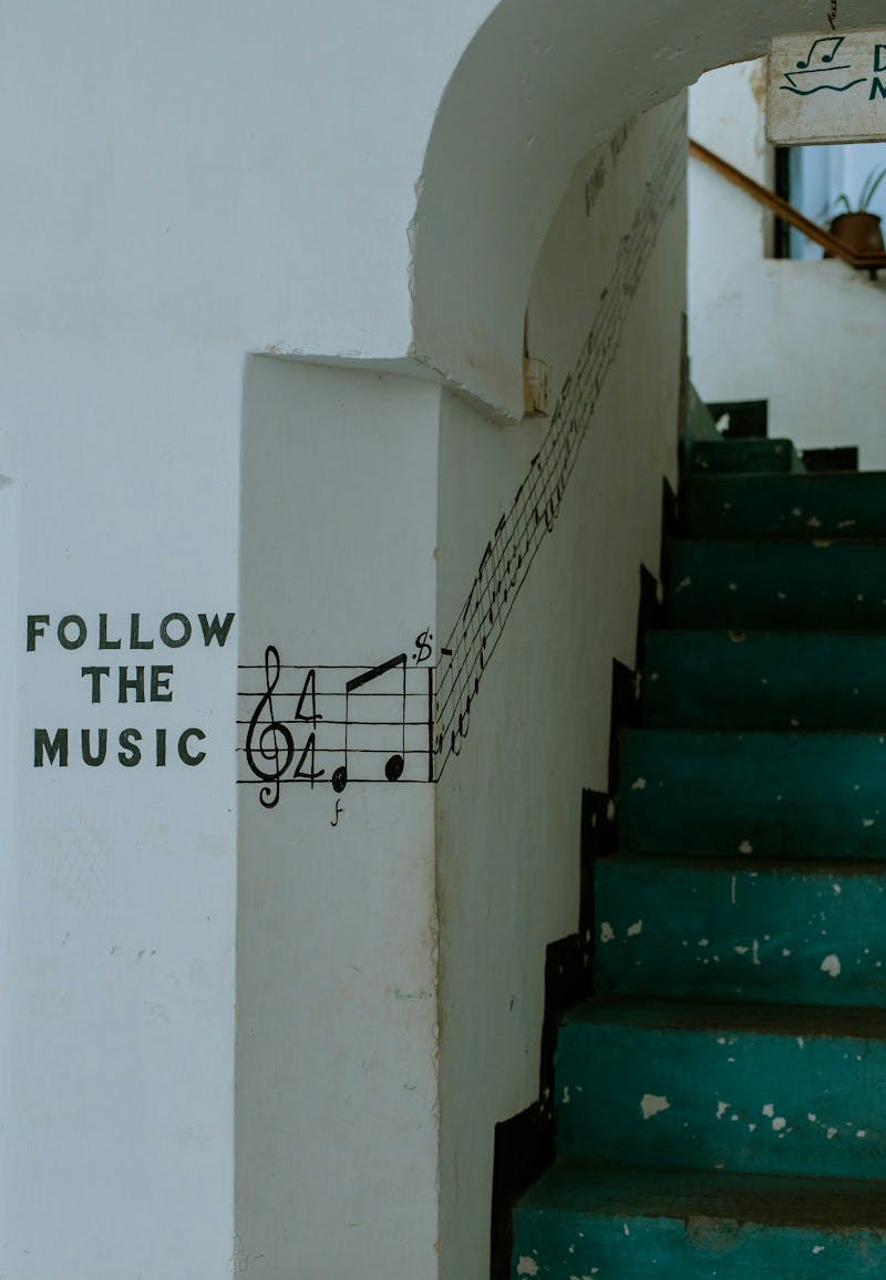 a set of stairs with a musical note painted on it