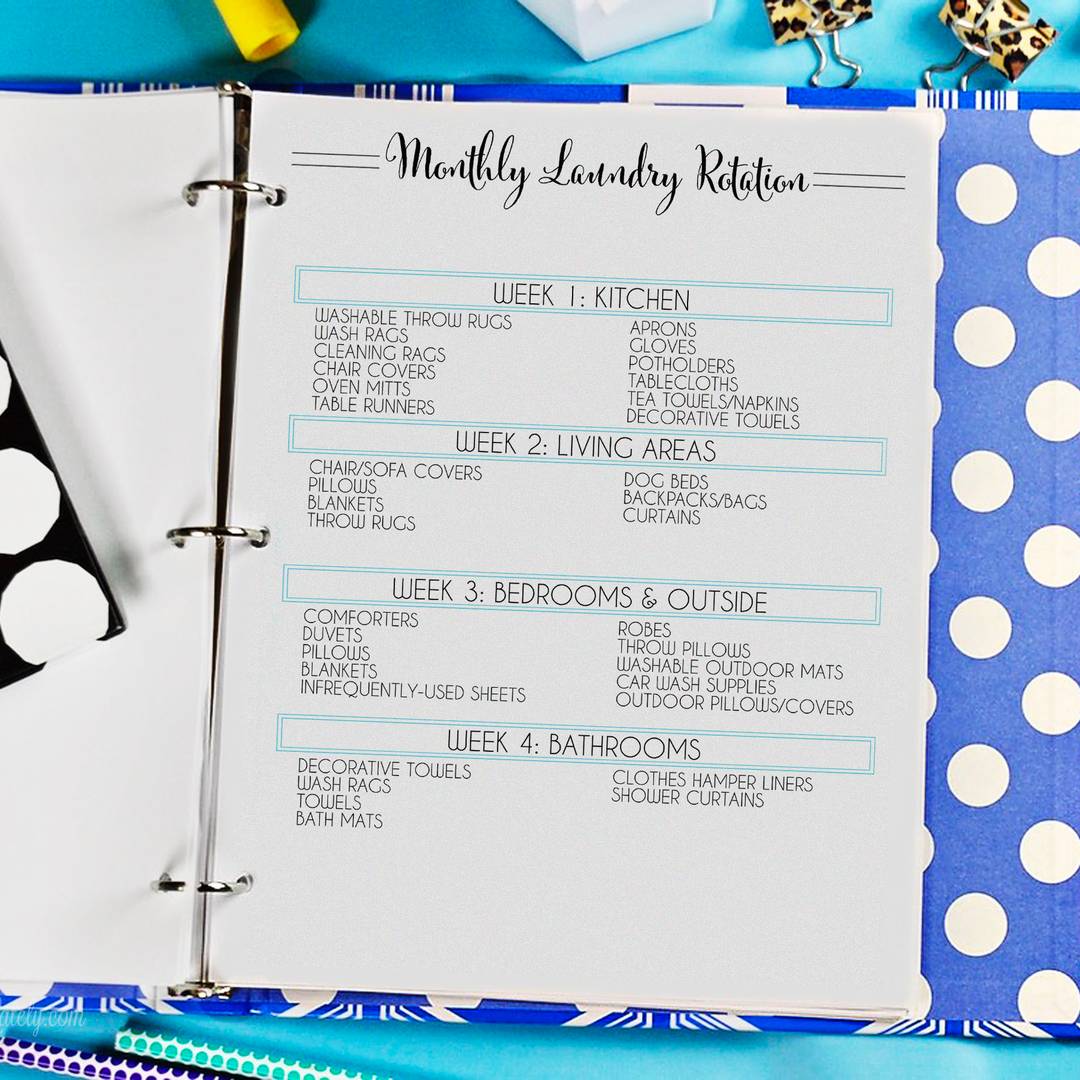 monthly laundry rotation printable in a notebook.