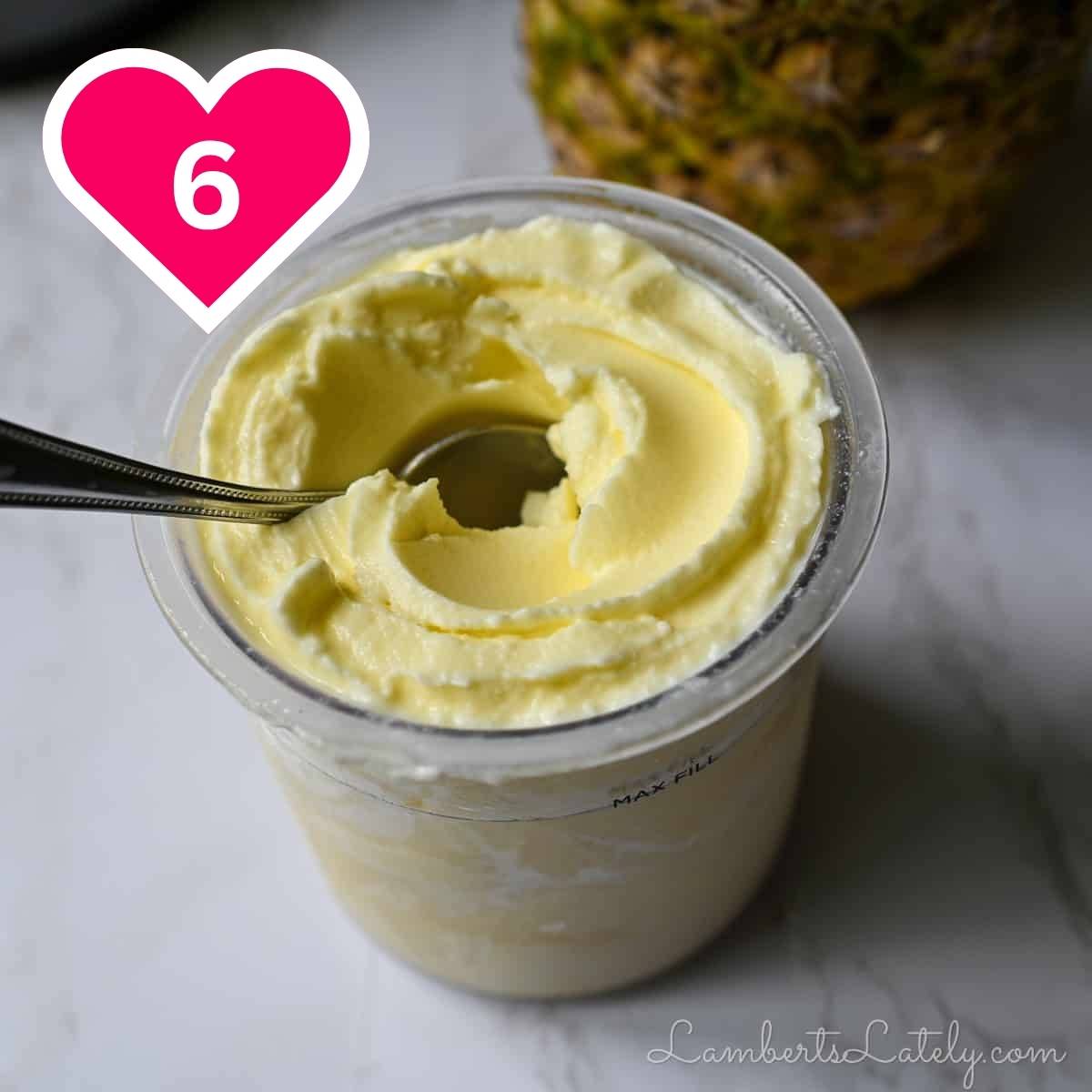 #6 - dole whip and a spoon in a ninja creami container.