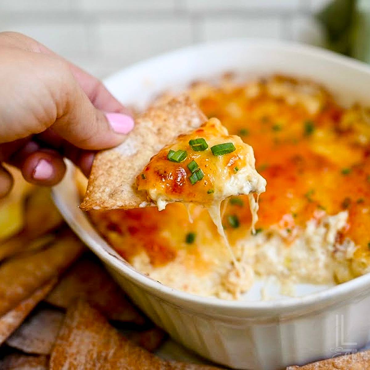 crab rangoon dip on a wonton chip.