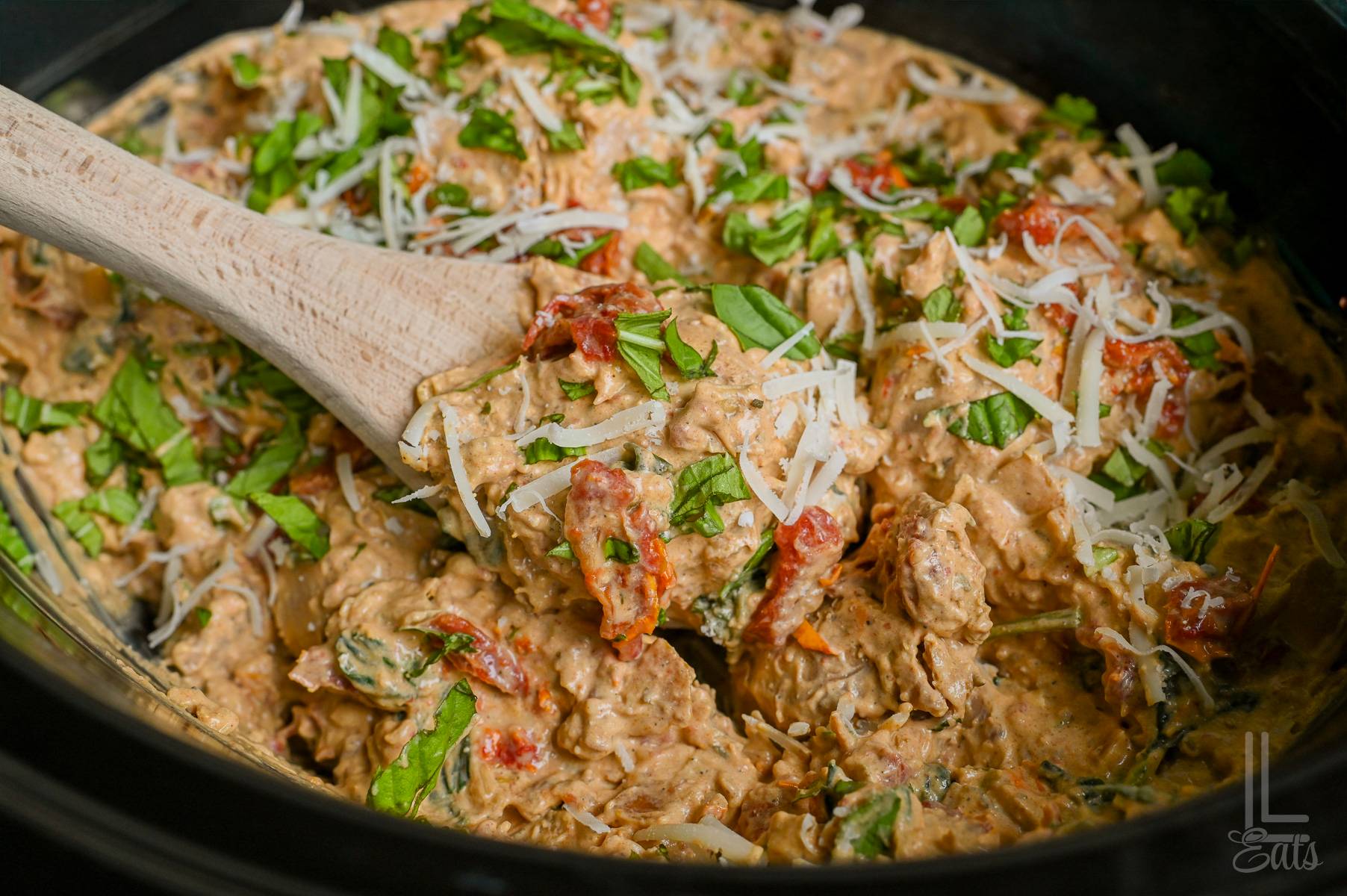 marry me chicken with a wooden spoon in a crock pot.