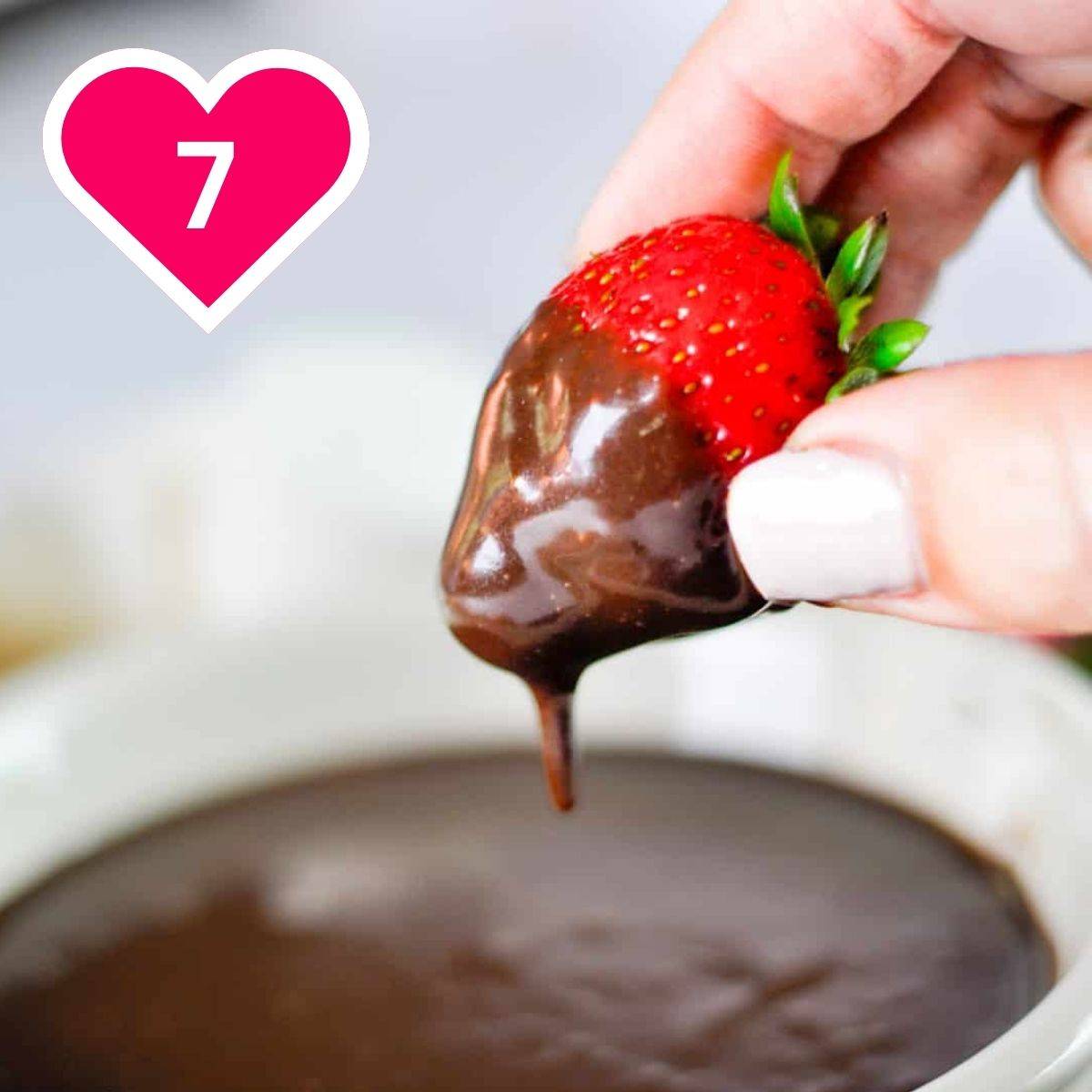 #7 - dipping a strawberry in chocolate dip.