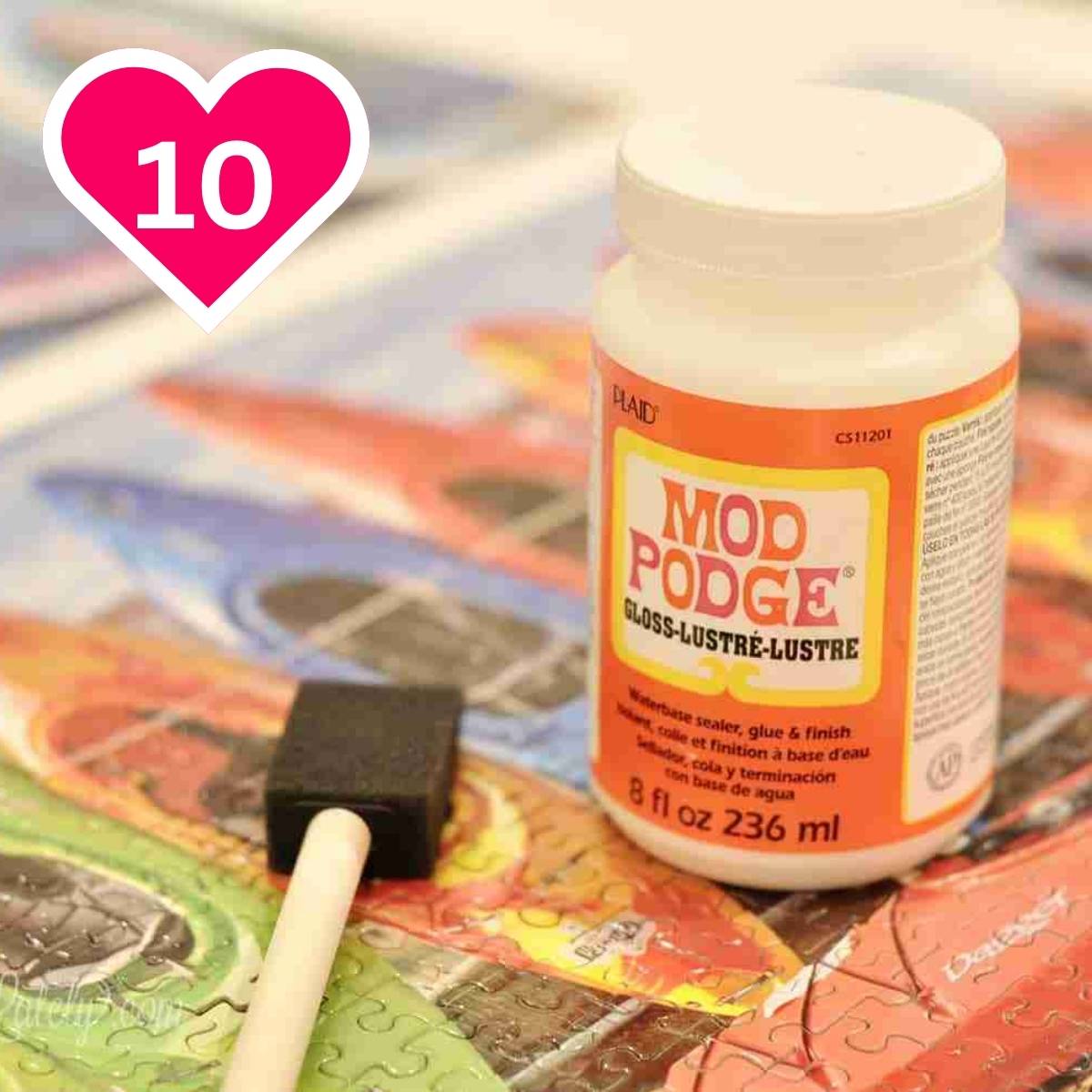 #10 - mod podge and a sponge brush on a puzzle.