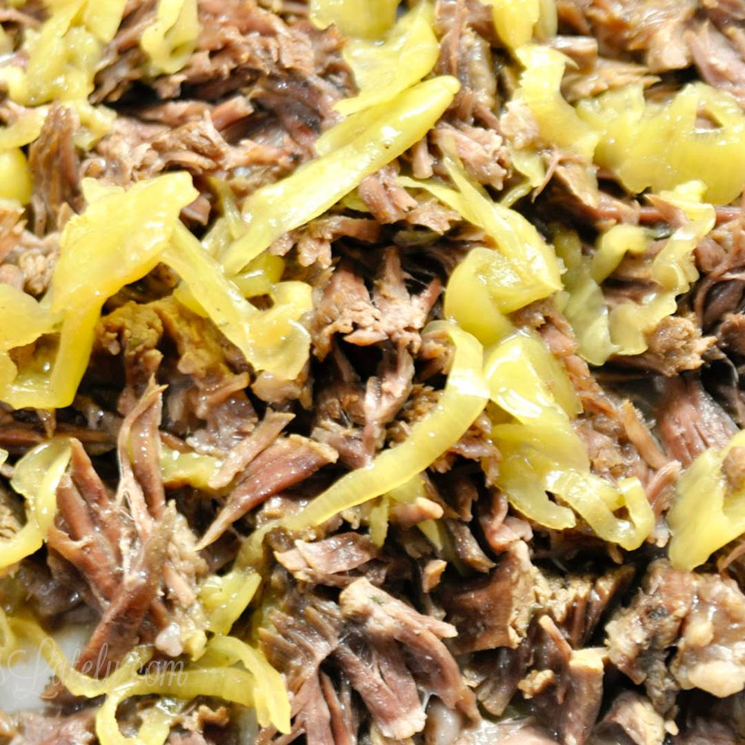 close of of shredded roast and peppers.