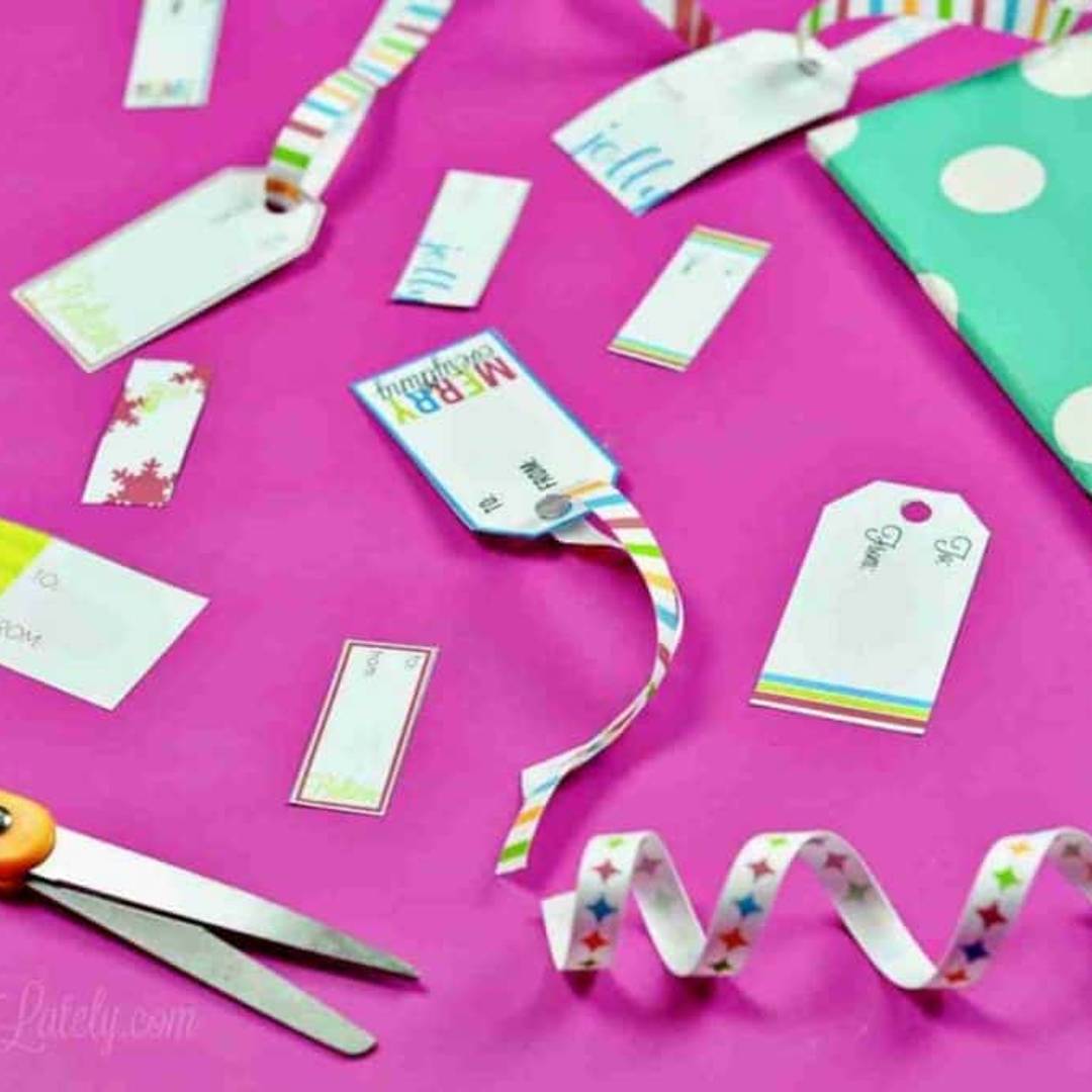 printable gift tags with ribbon, scissors.