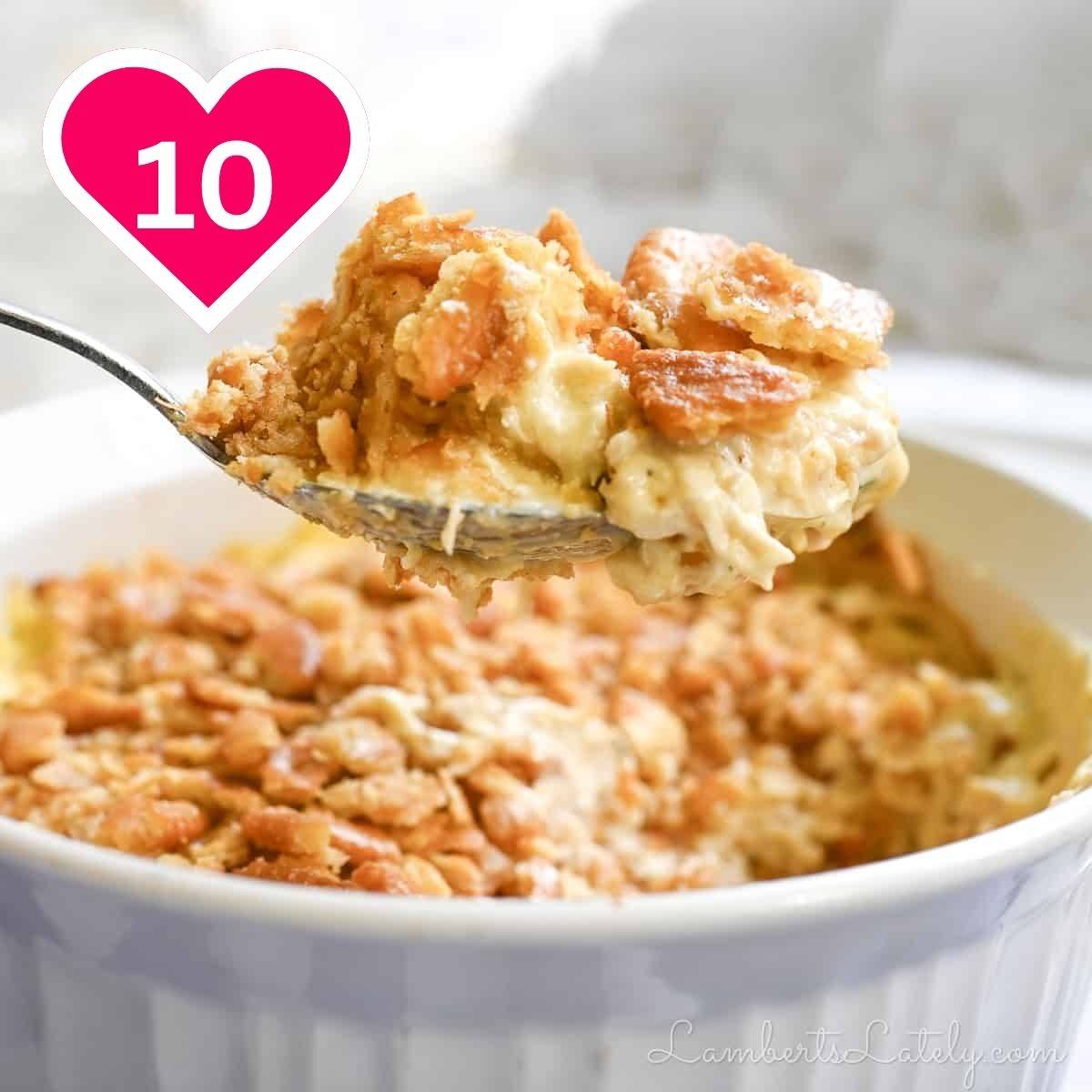 #10 - holding chicken casserole in a spoon.