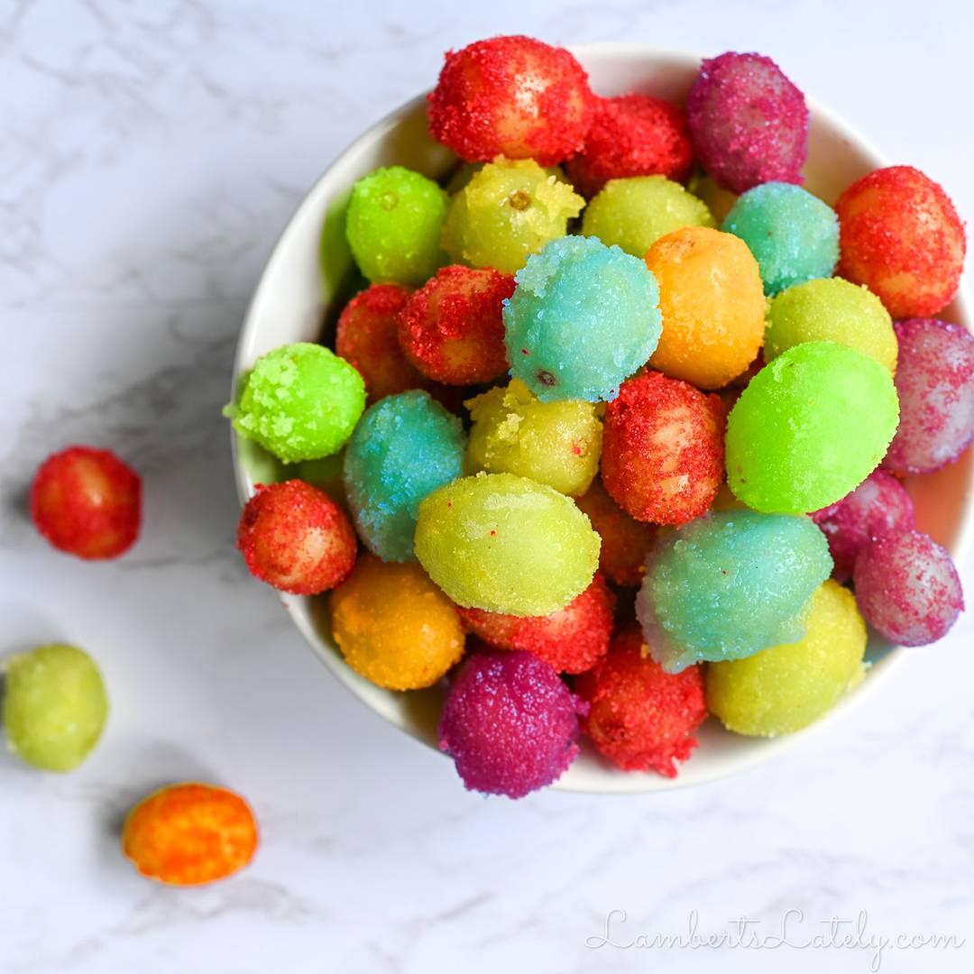 colorful frozen candied grapes in a bowl.