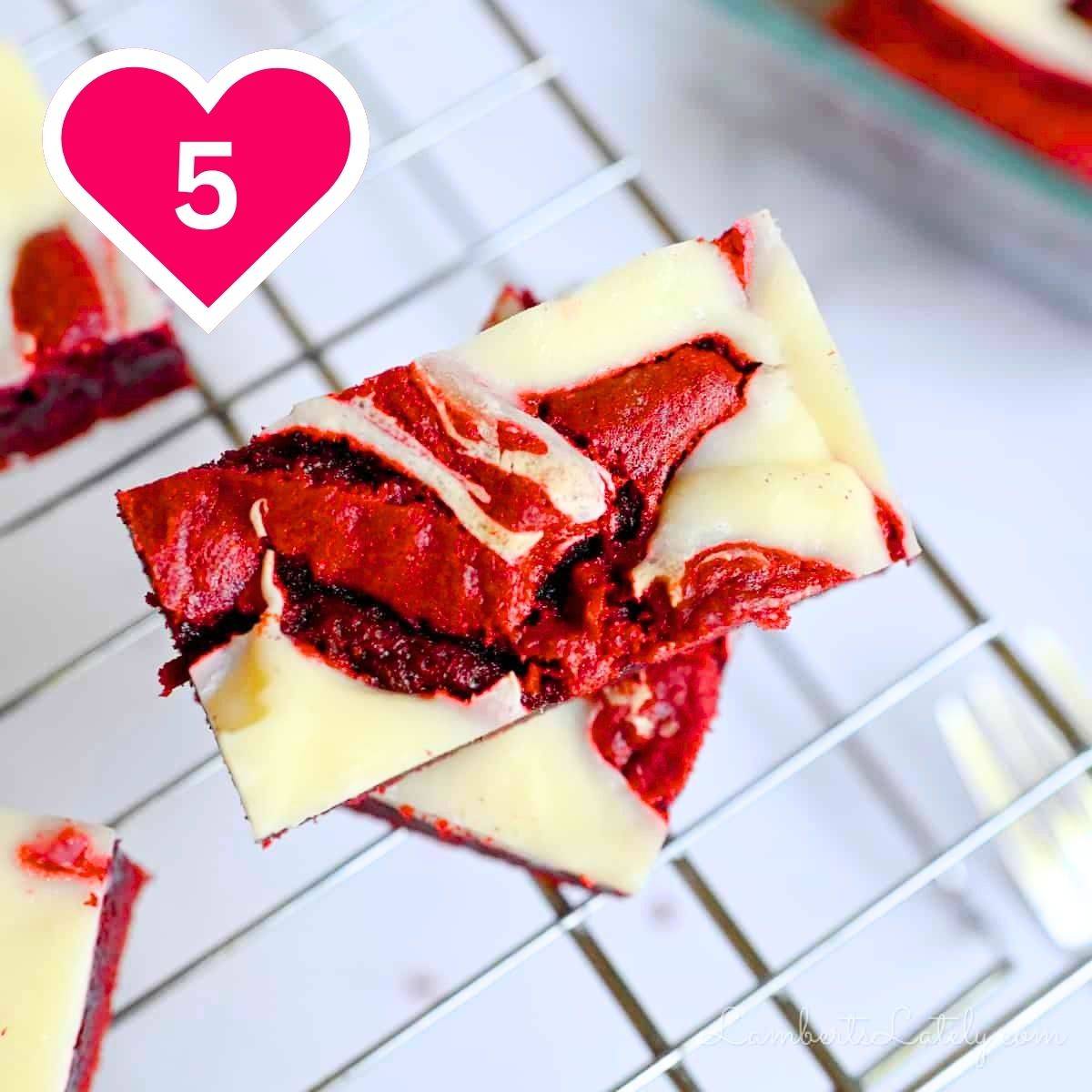 #5 - stack of red velvet brownies on a baking rack.