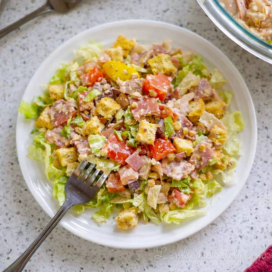 italian hoagie salad on a plate, with a fork.