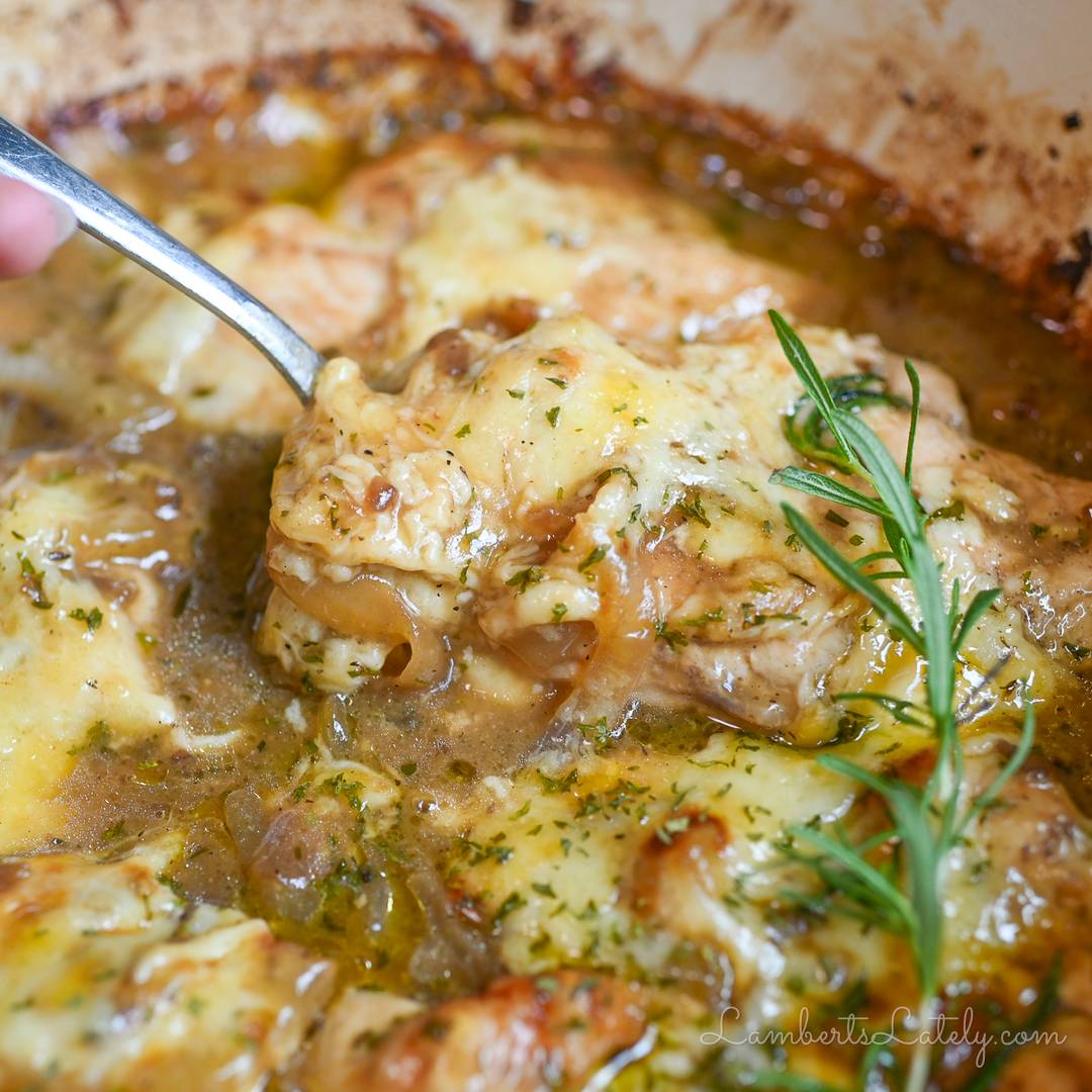 holding a spoon in a french onion chicken bake.