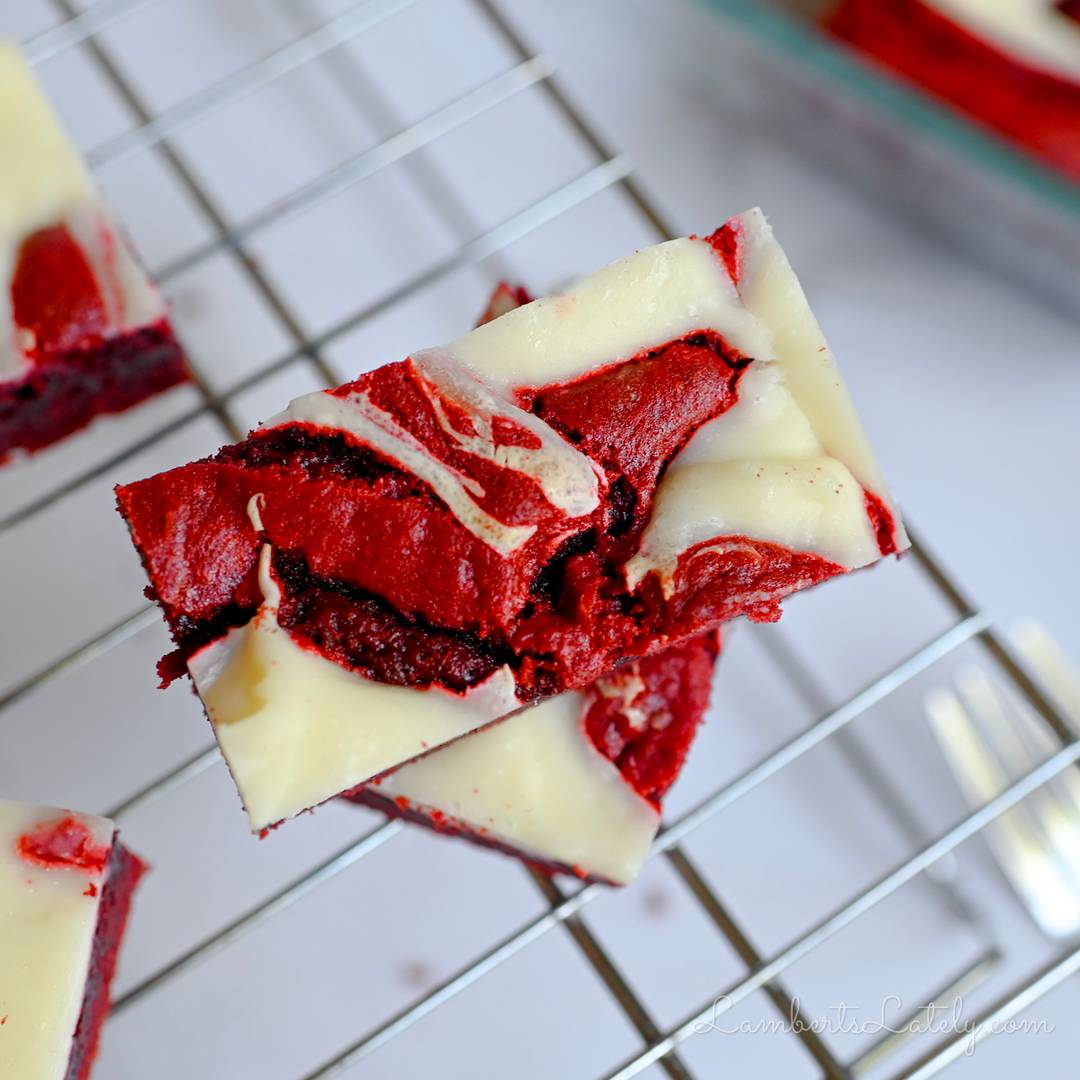 looking down at a red velvet brownie marbled with cream cheese.