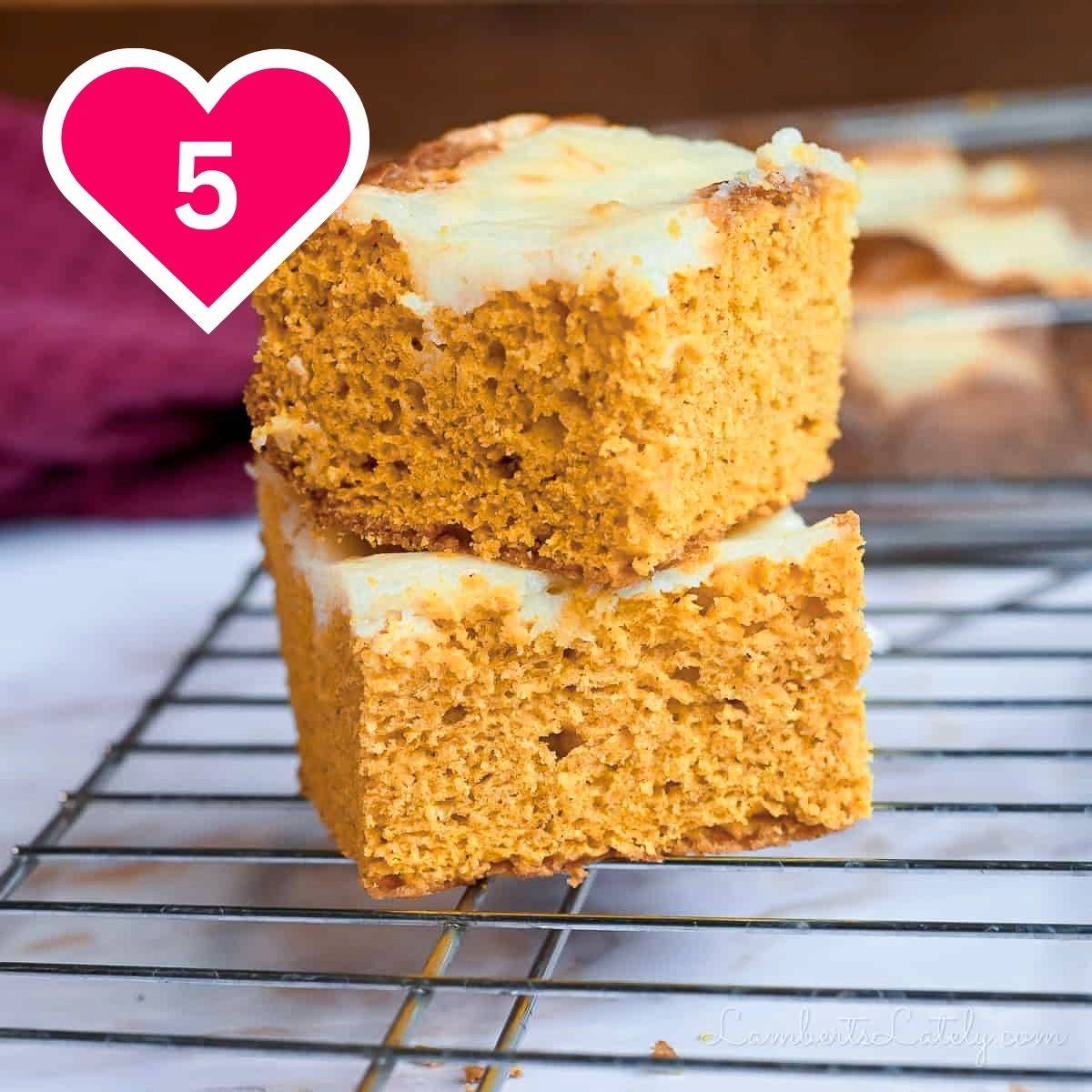 #5 - pumpkin bars stacked on a wire baking rack.