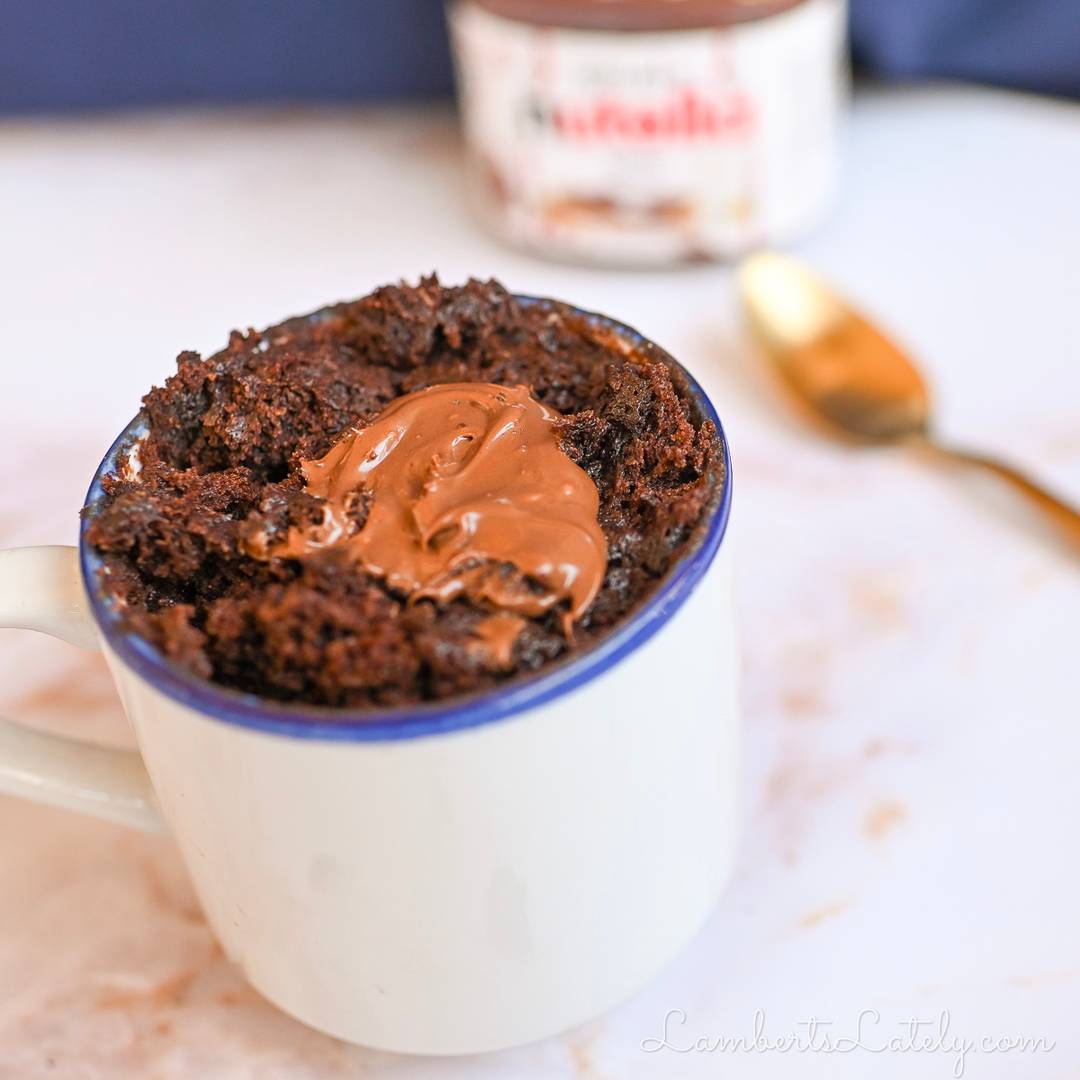 nutella mug cake with large dollop of nutella in the middle.