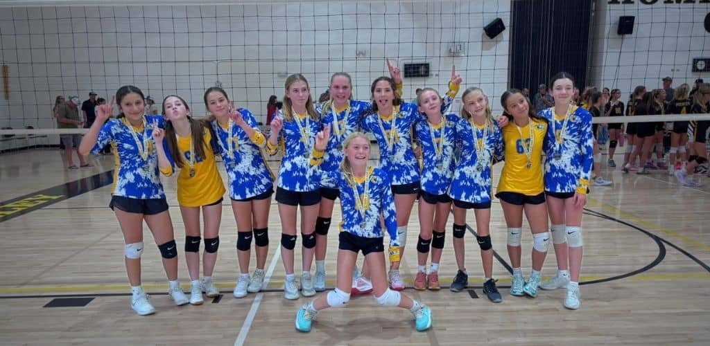 Mindy’s 7th-grade volleyball team celebrating their tournament championship after she began the long day with mindfulness and meditation practices from the SOULutions App.