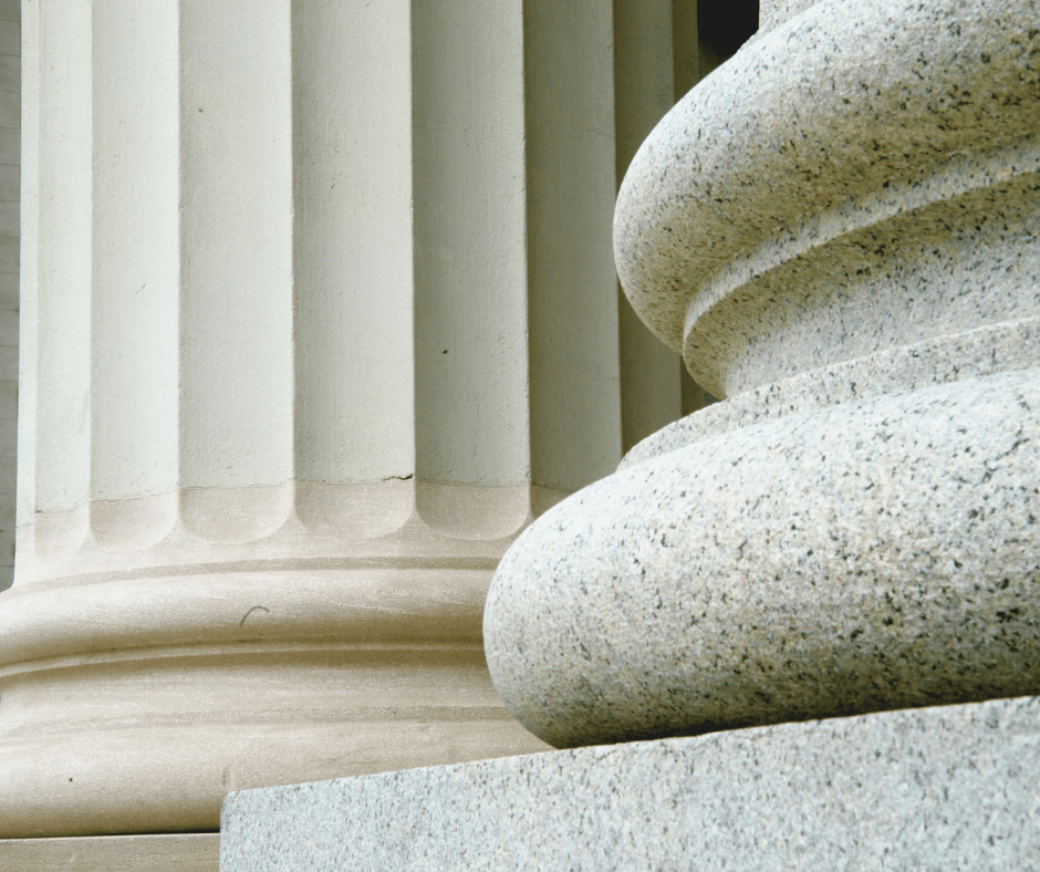Pillars sitting atop stone foundations