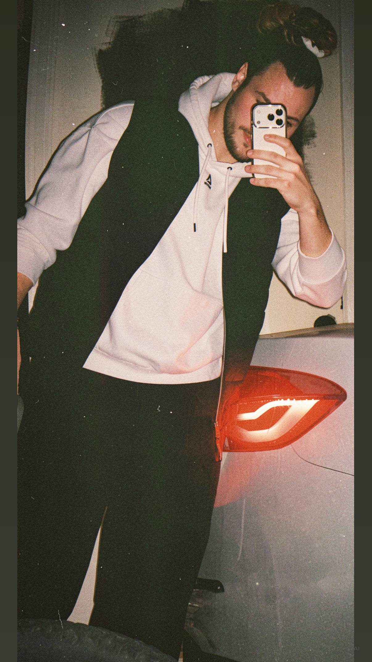 Person reading an open book with a bracelet.