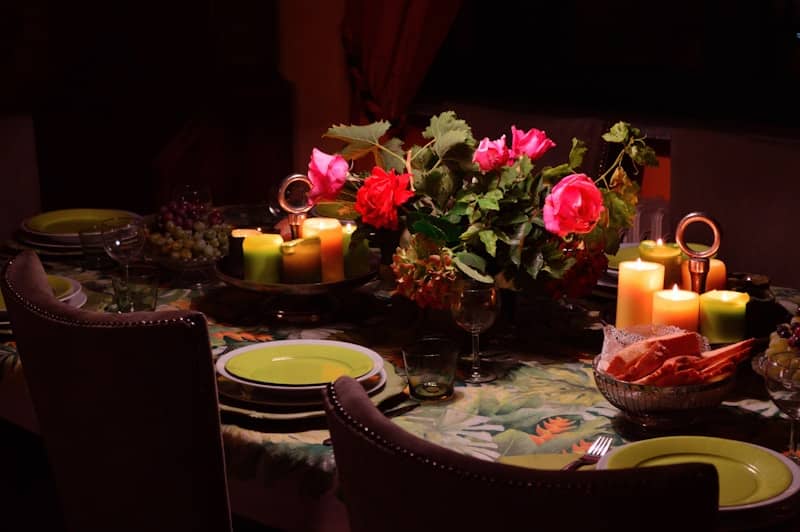 A table with a bunch of candles on it