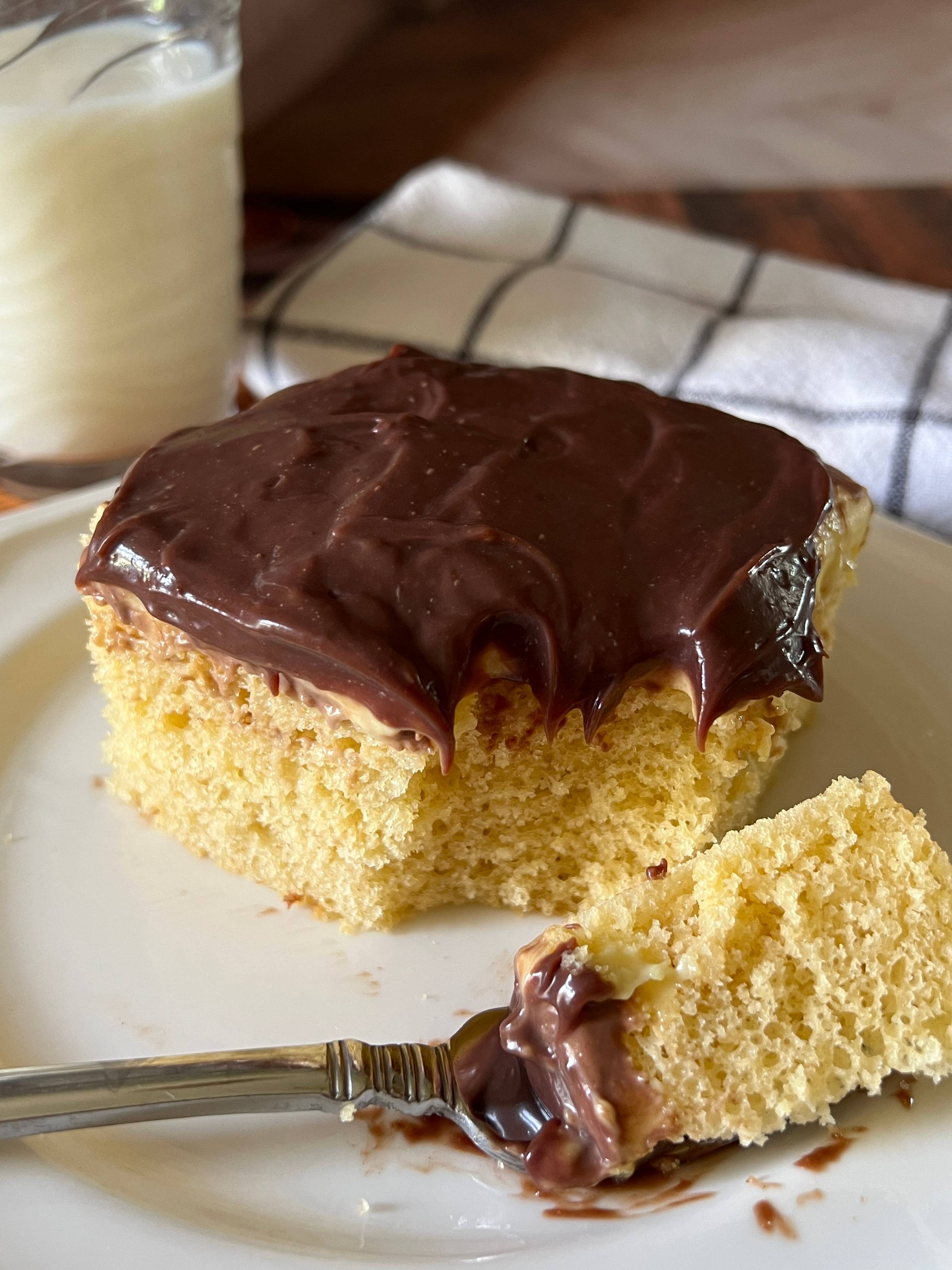 slice of boston cream pie poke cake