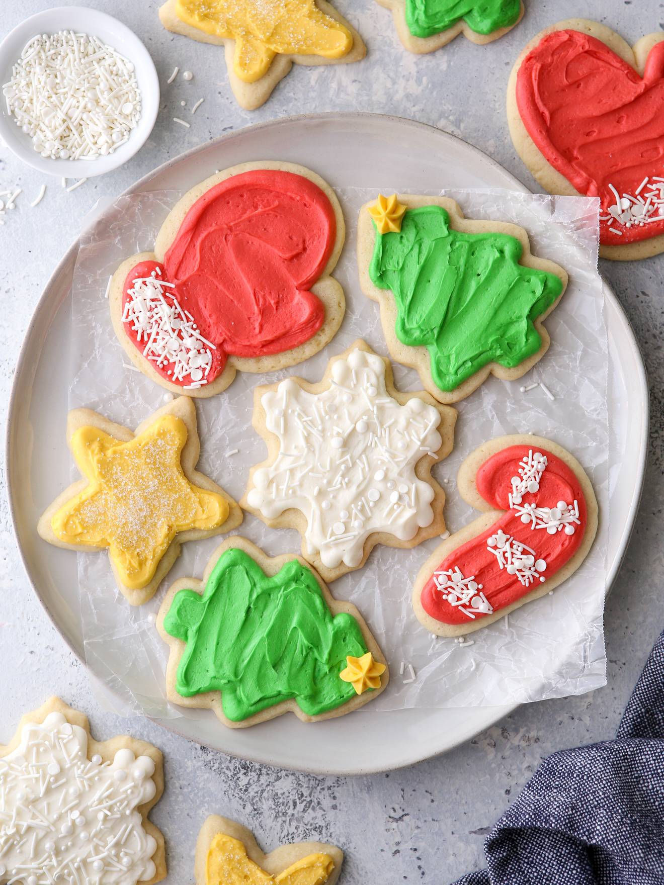 frosted sugar cookies on a plate