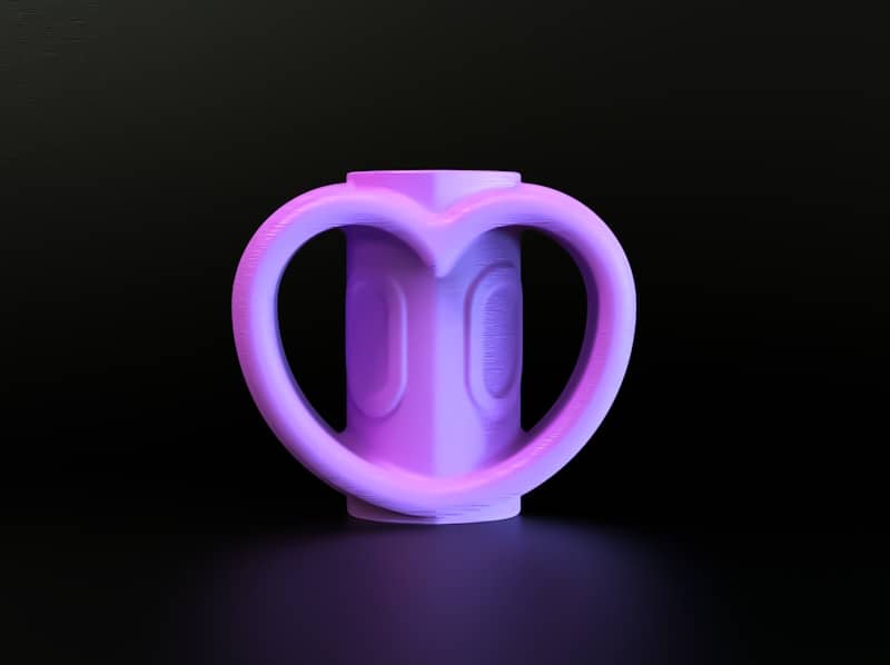 A purple cup sitting on top of a table