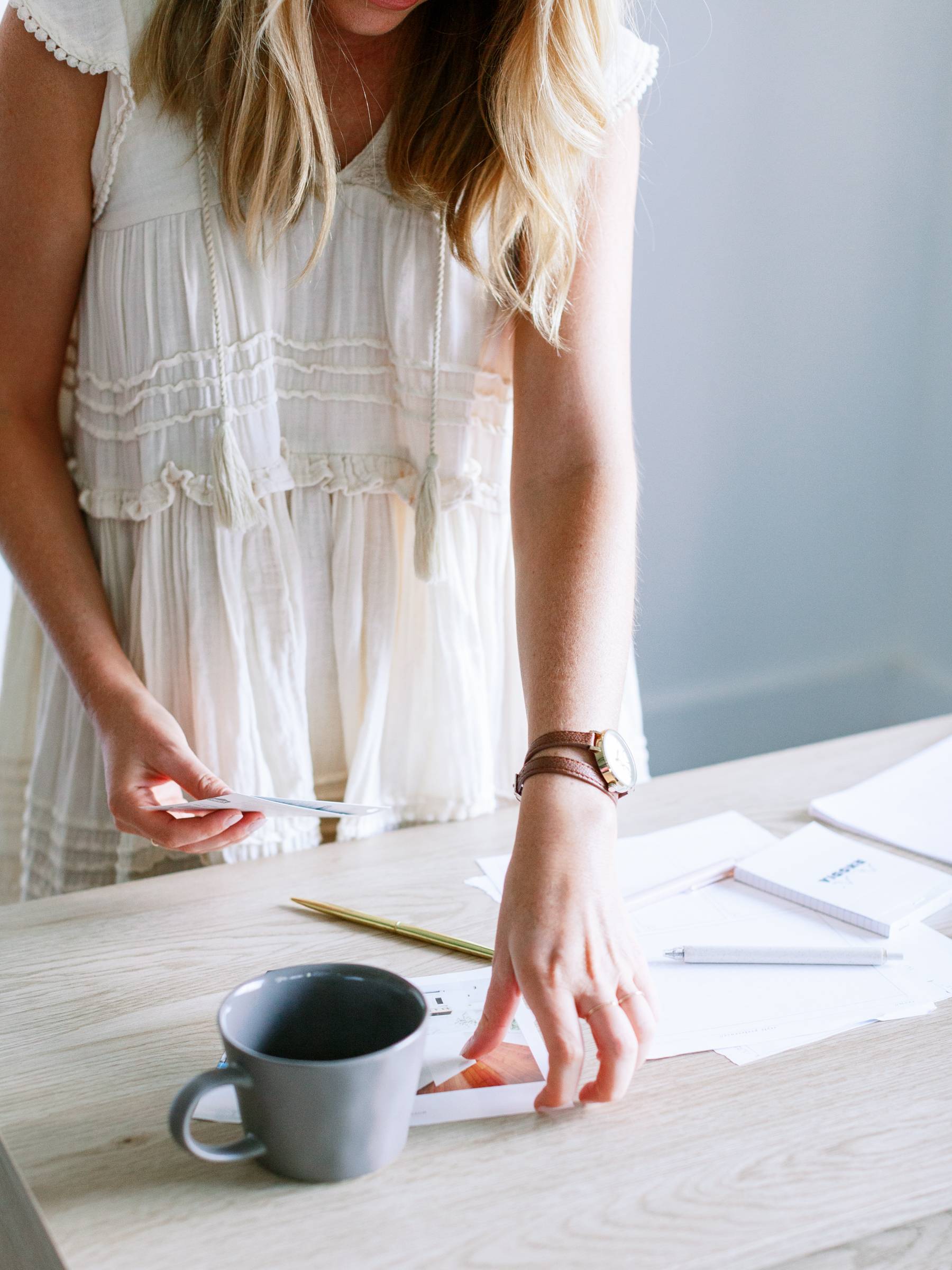 Woman journaling at her desk