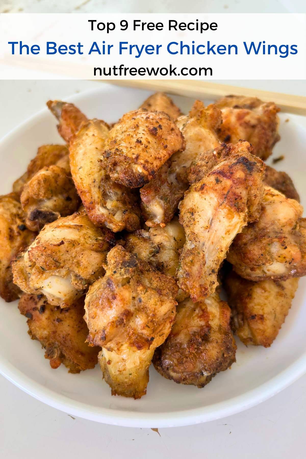 air fryer chicken wings in a white serving plate