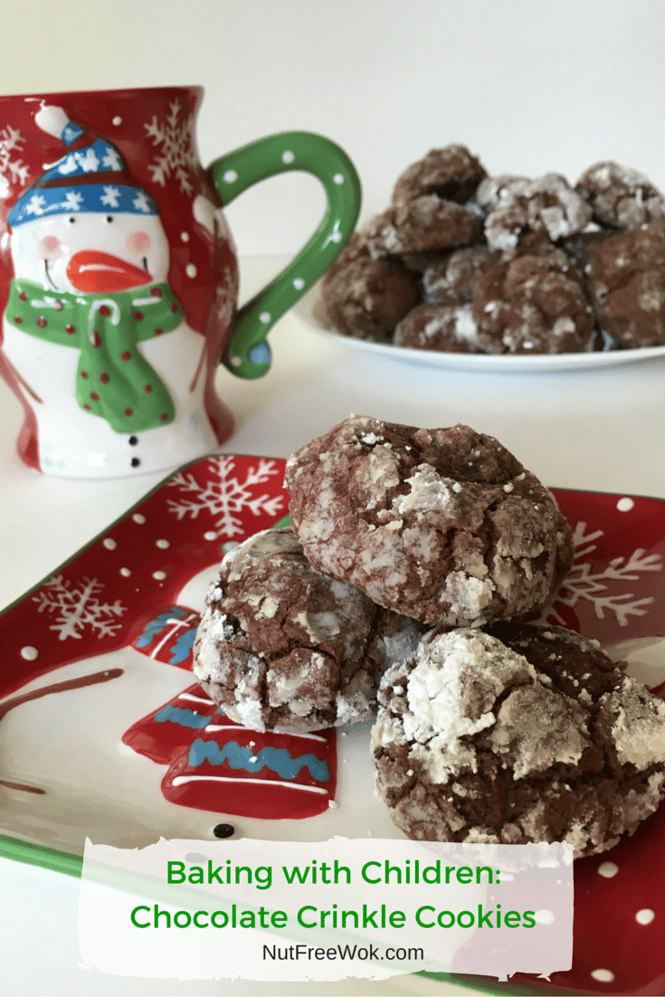 chocolate crinkle cookies on a festive red holiday snowman plate