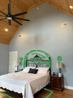 bedroom with bed, headboard, and decor