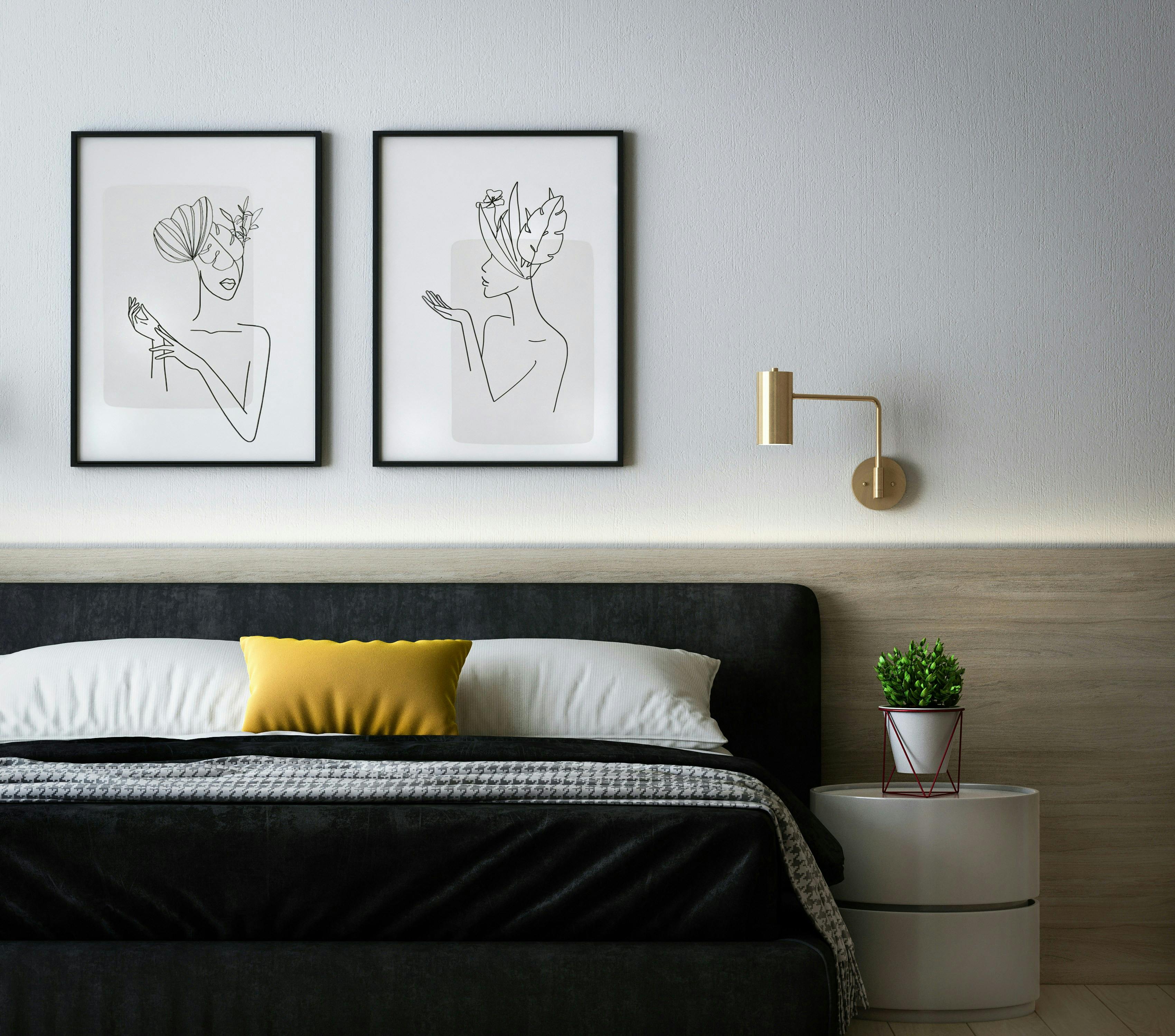 bed with art prints