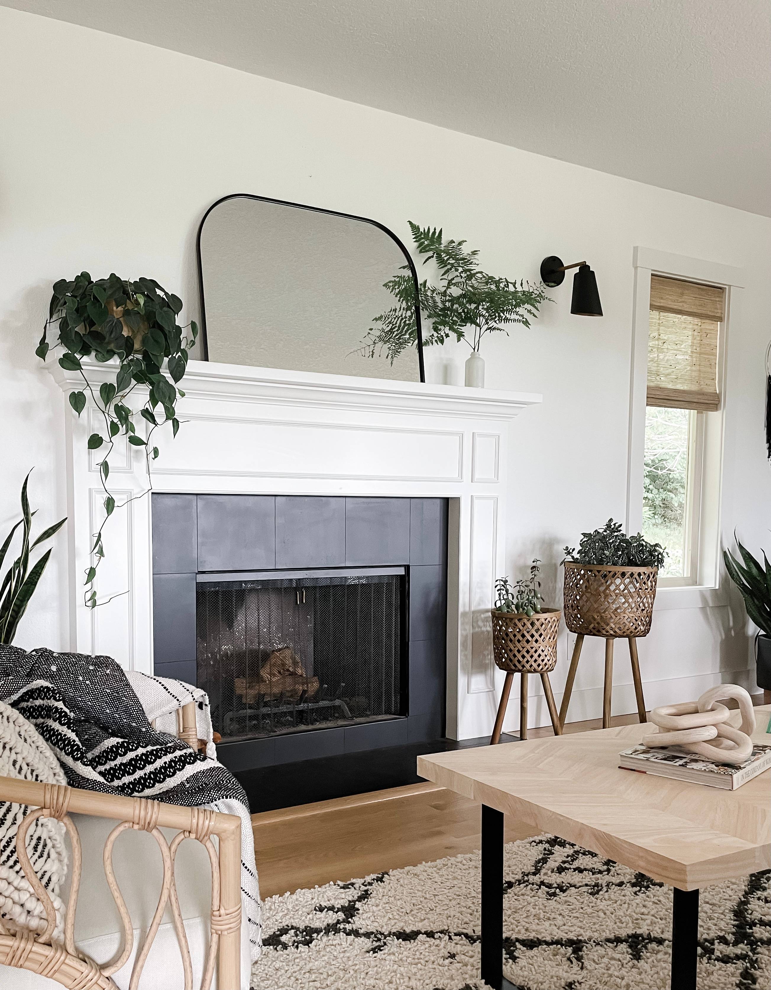 living room with black and white fireplace