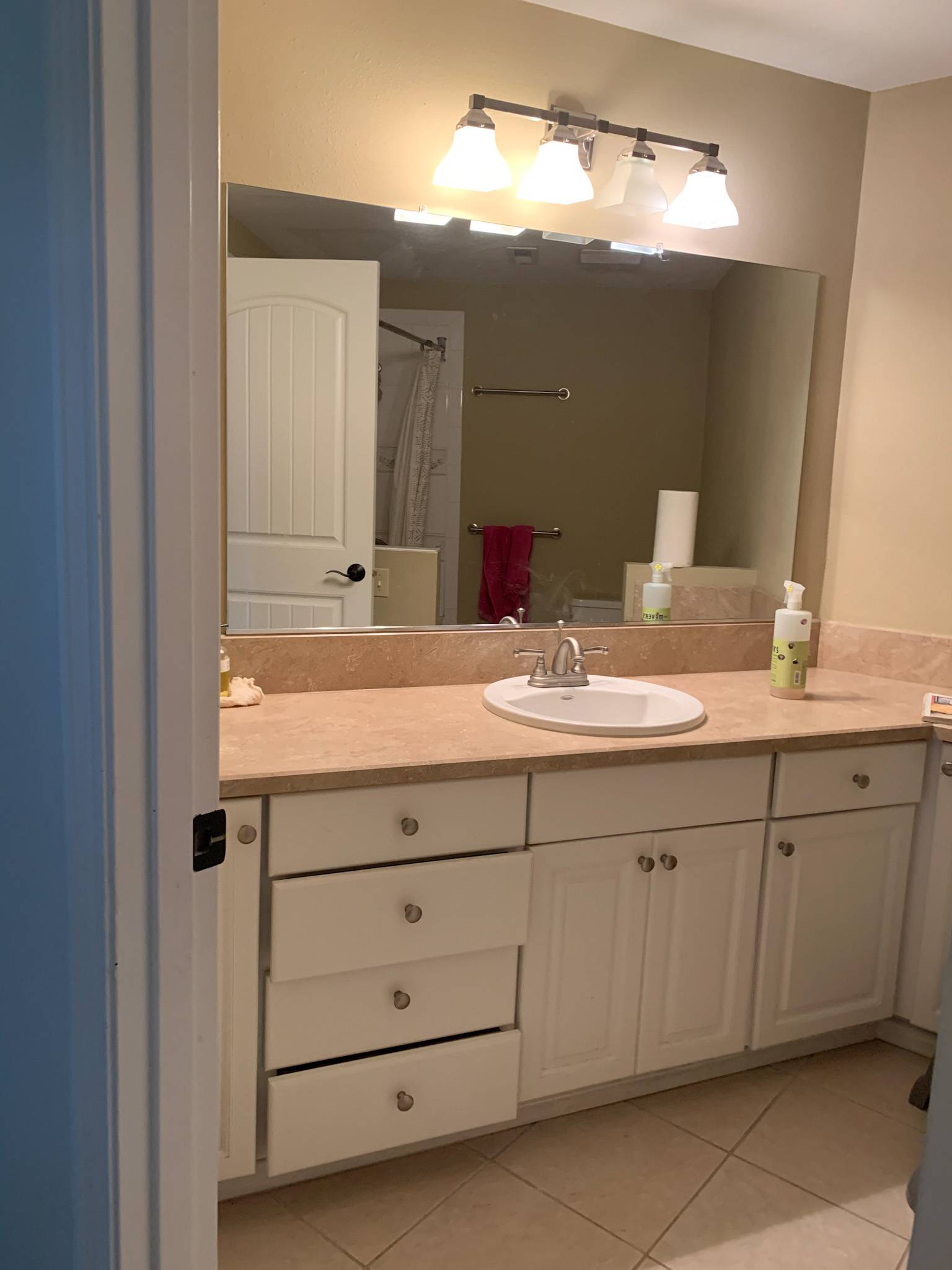 kitchen with oak cabinets and granite tile counter