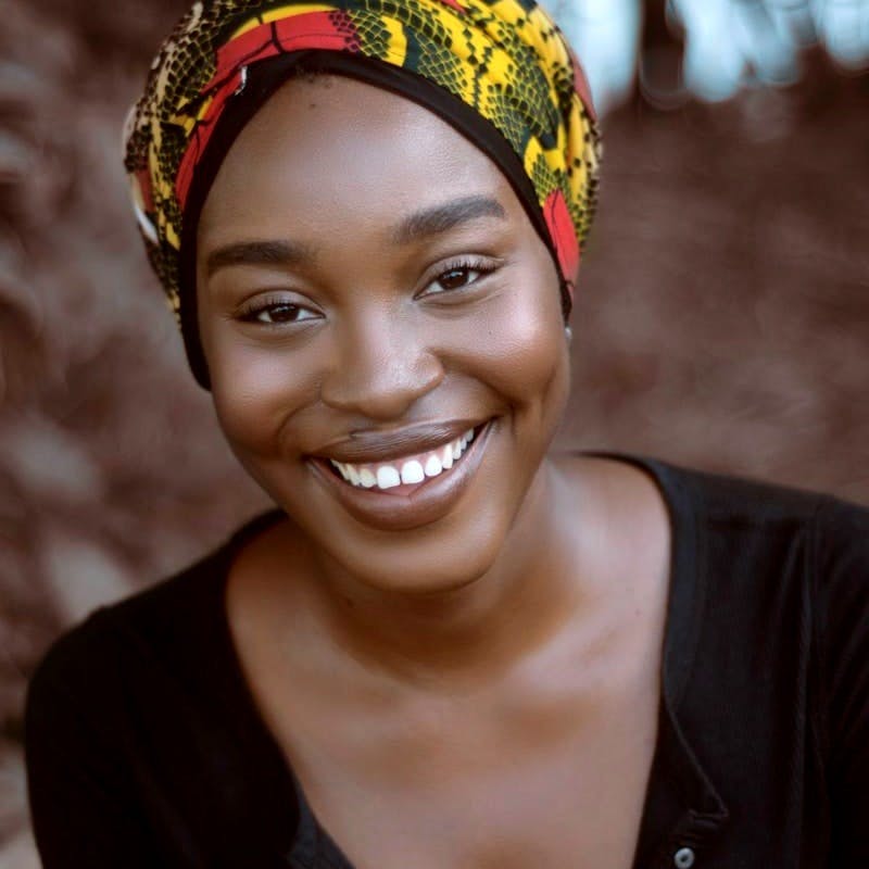 smiling woman wearing turban