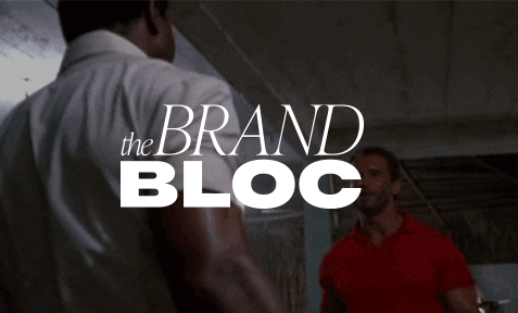 Strong handshake with The Brand Bloc logo.